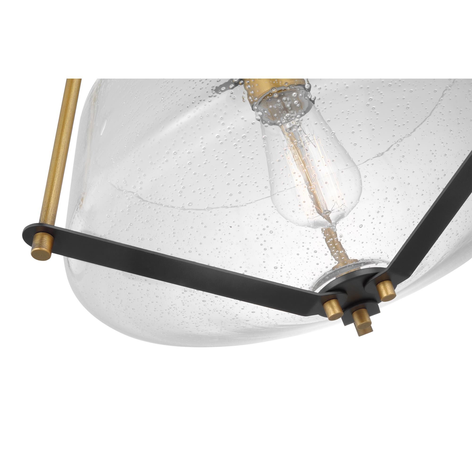 Shown in Matte Black and Natural Brass finish and Clear Seeded glass