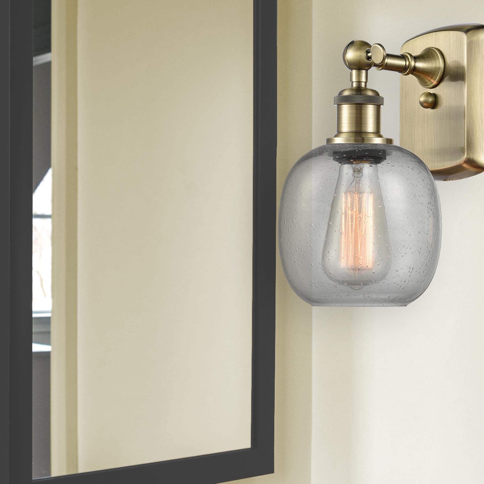 Shown in Antique Brass finish and Seedy Belfast glass and None shade