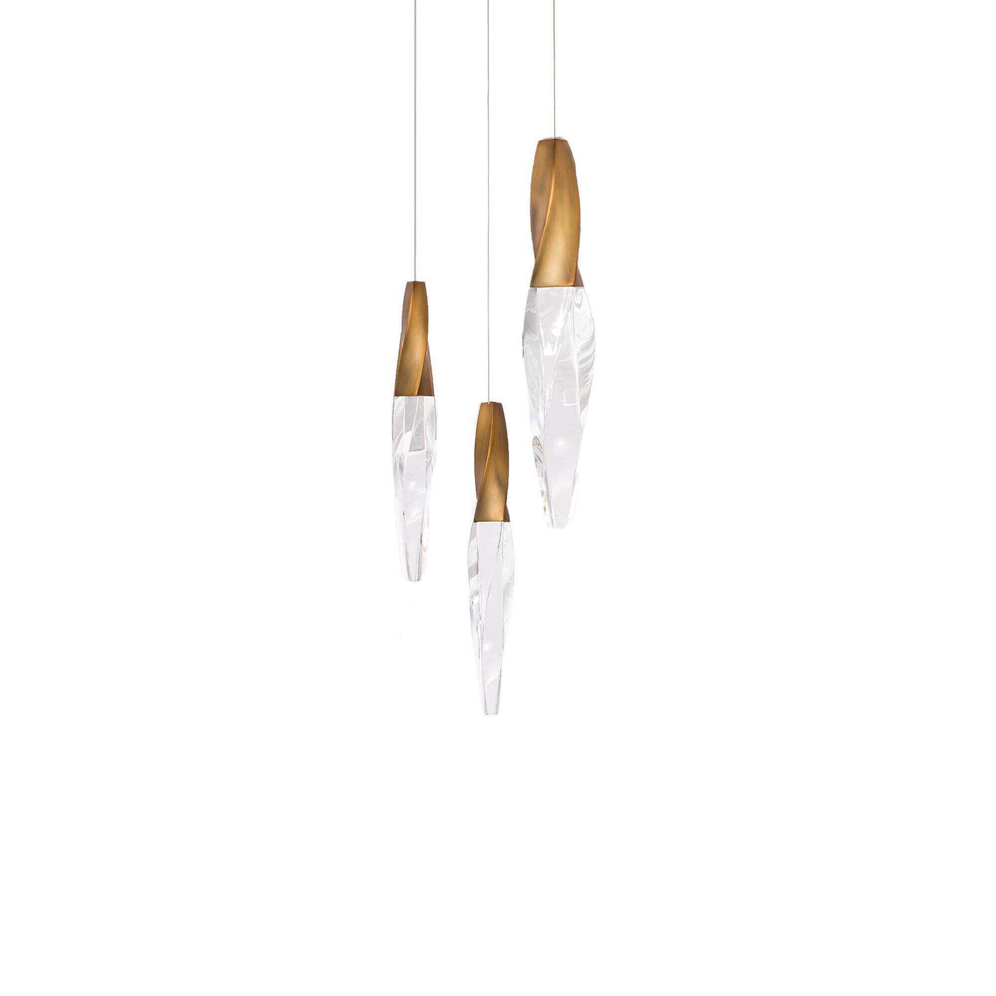 Shown in Aged Brass finish and Optic crystal and Crystal glass