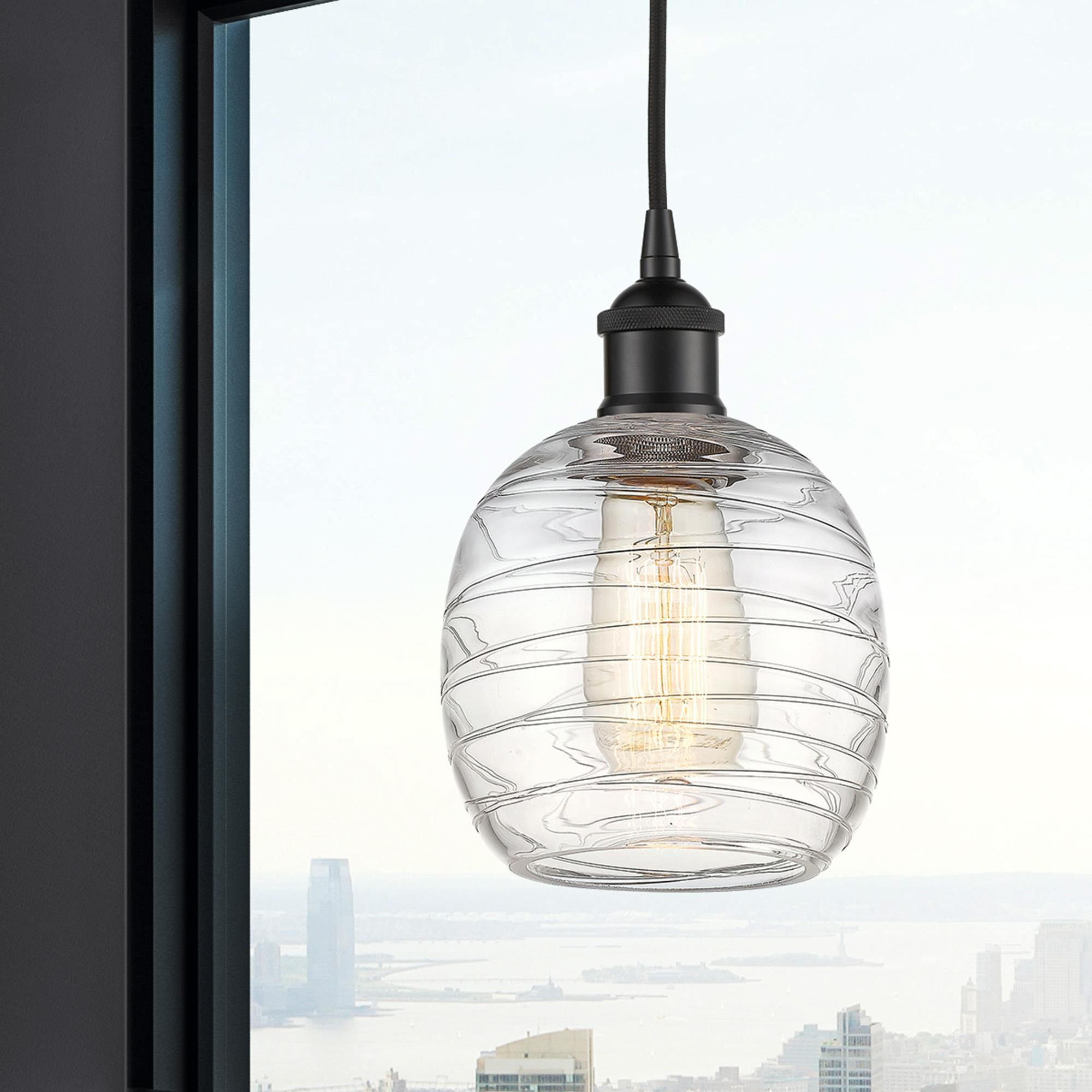 Shown in Matte Black finish and Deco Swirl glass