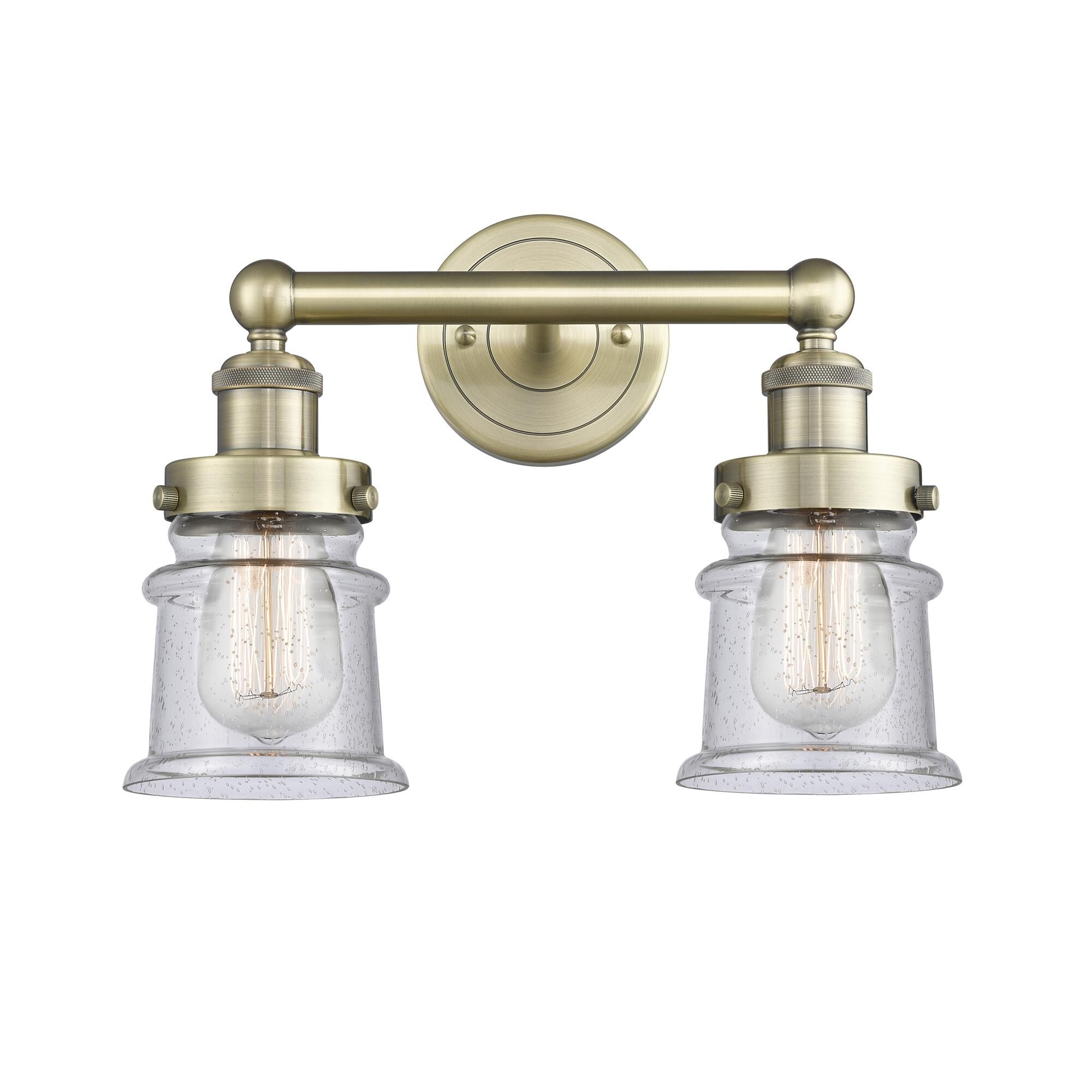 Shown in Antique Brass finish and Seedy glass