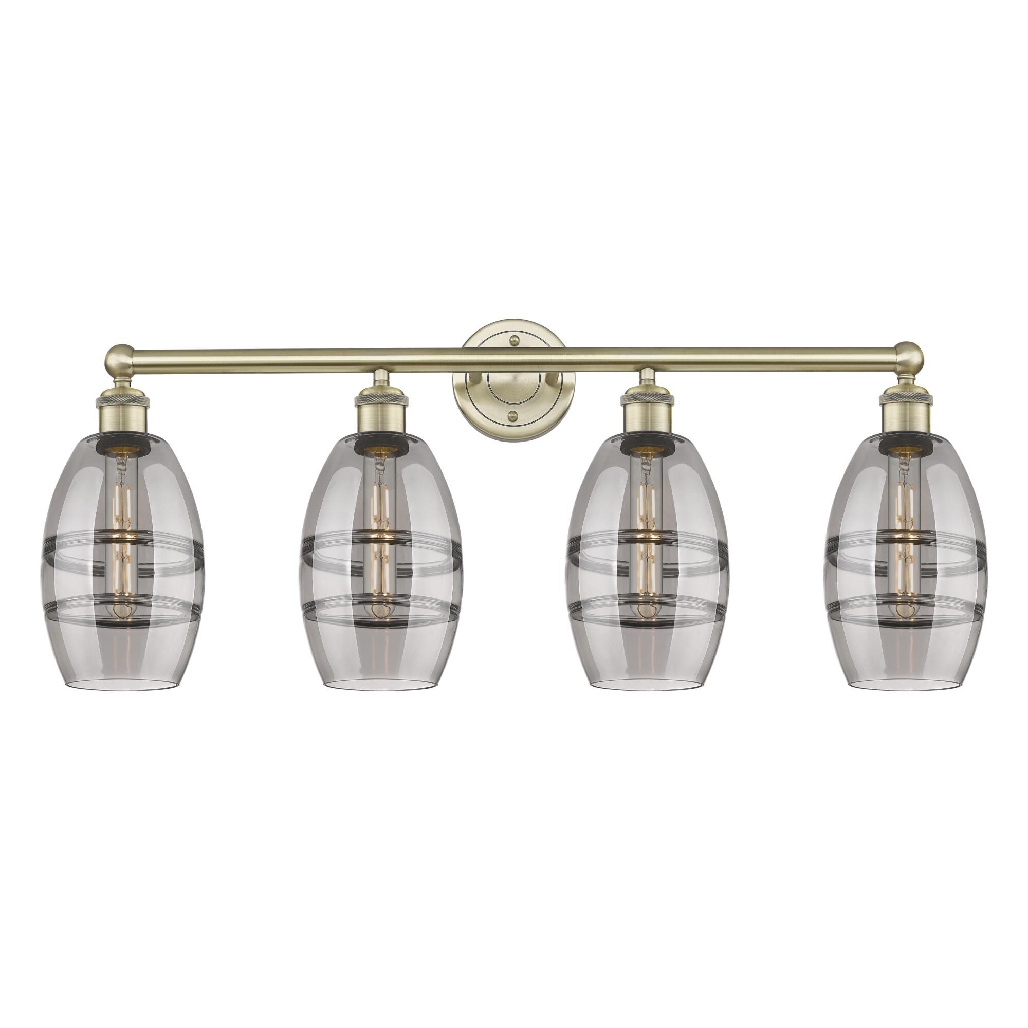 Shown in Antique Brass finish and Light Smoke glass