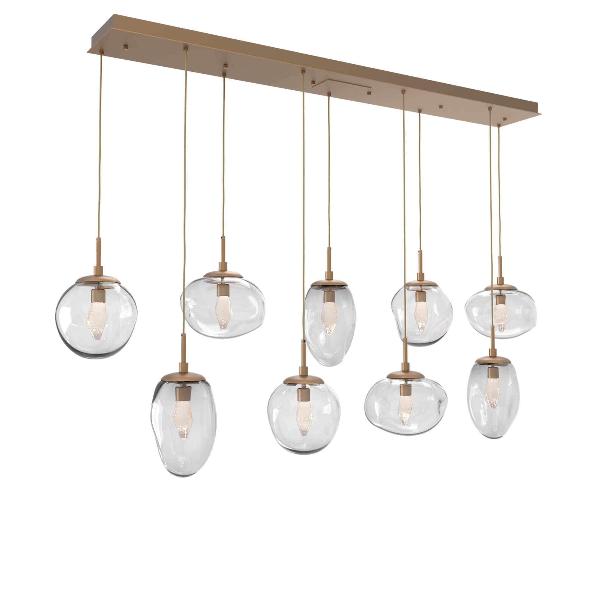 Shown in Novel Brass finish and Geo Inner And Clear Outer glass