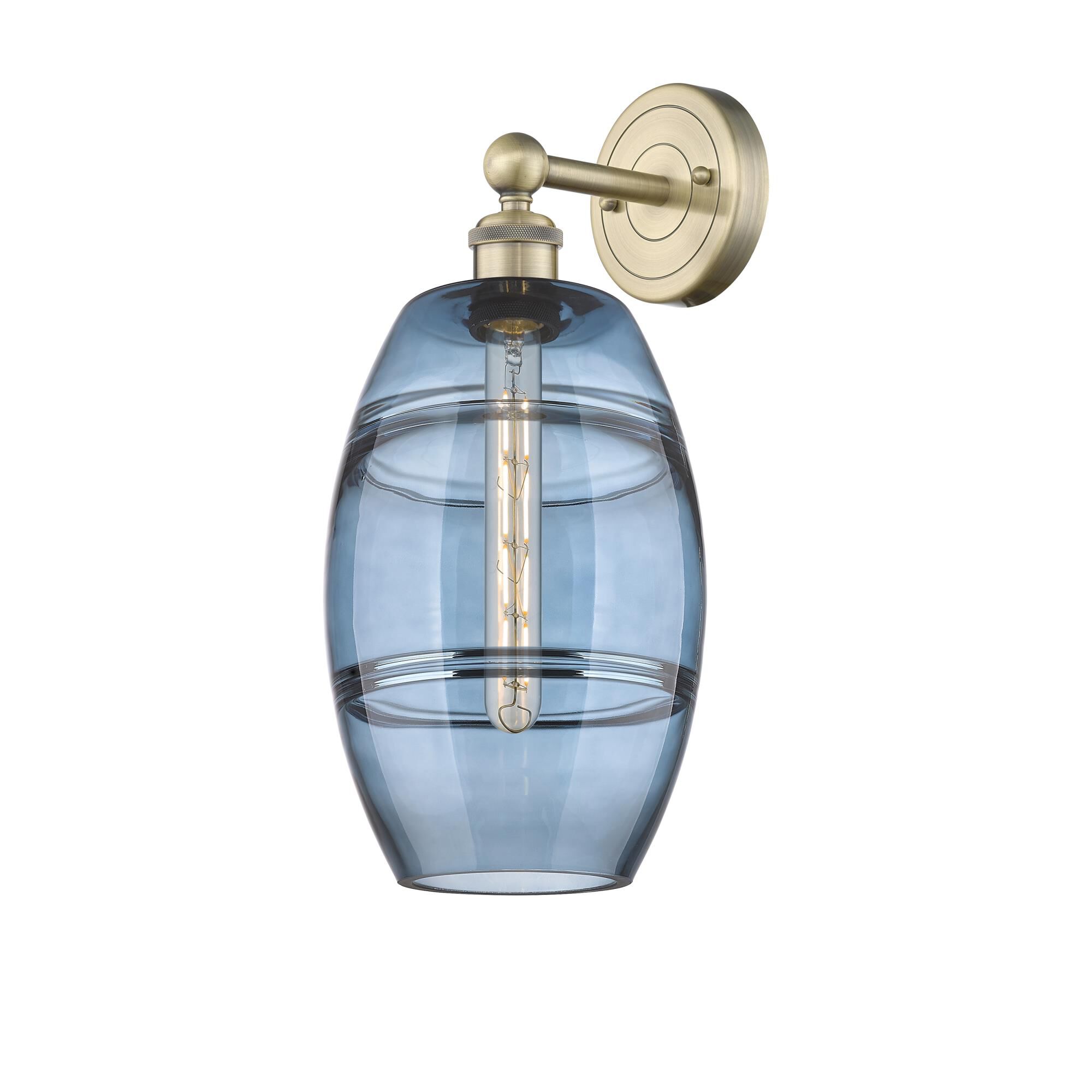 Shown in Antique Brass finish and Princess Blue glass