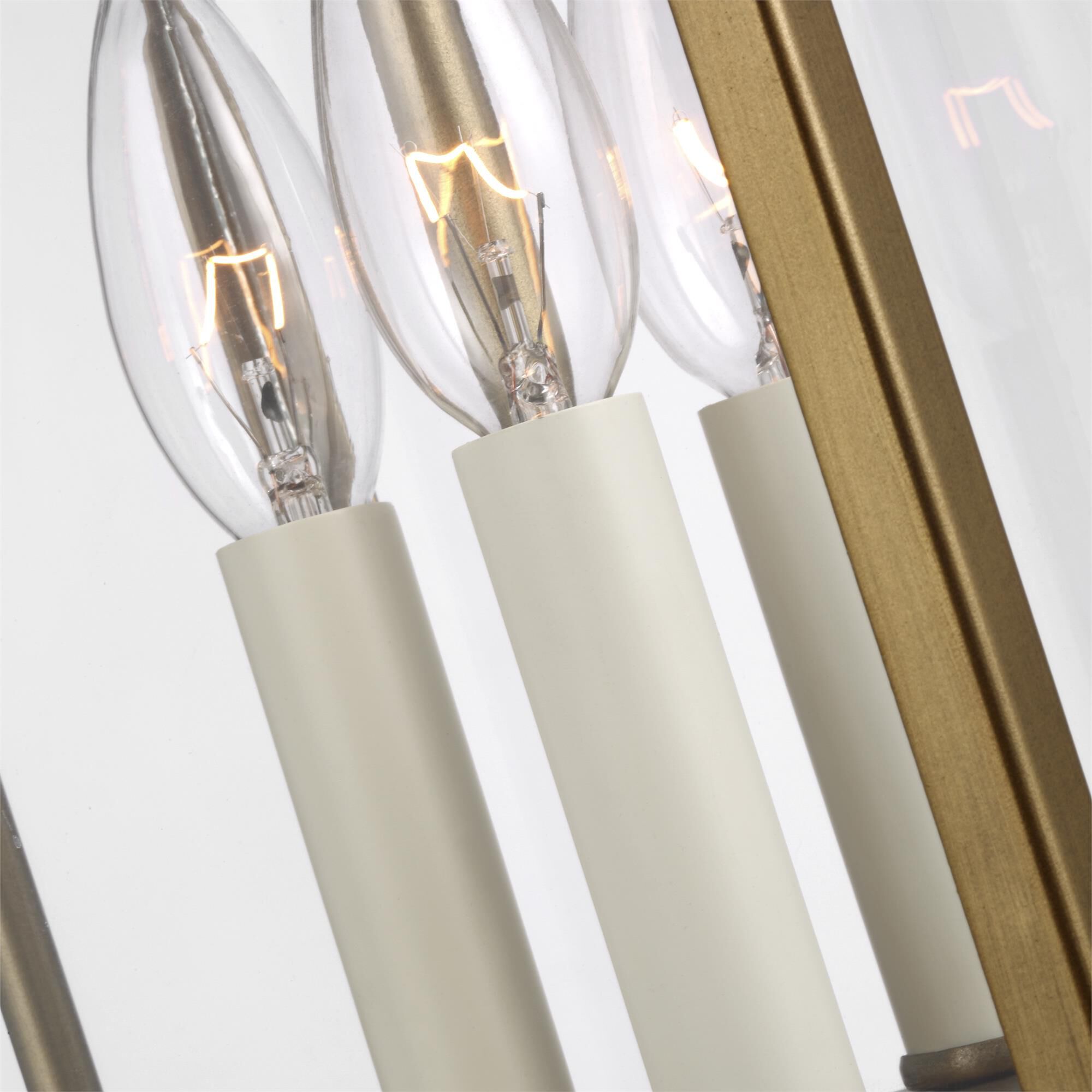 Shown in Painted Distressed Brass finish and Clear Panels glass
