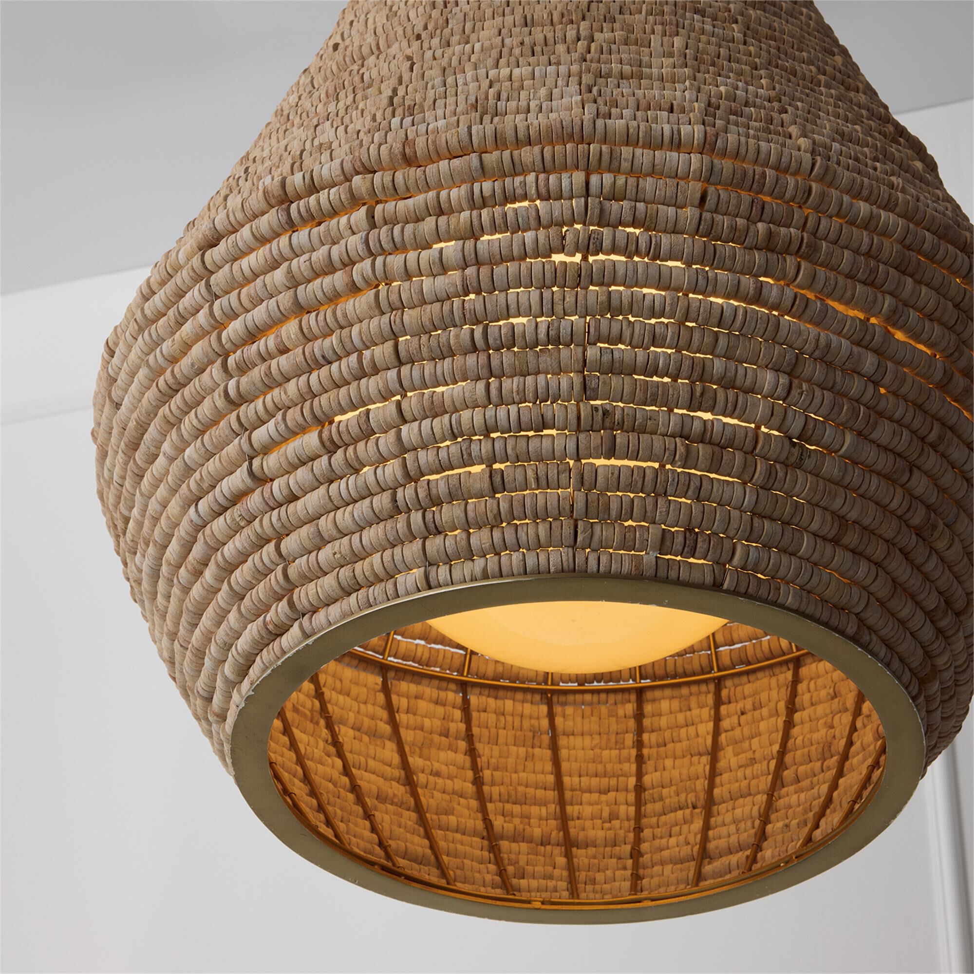 Shown in Light Fawn And Matte Brass finish and White  Globe glass
