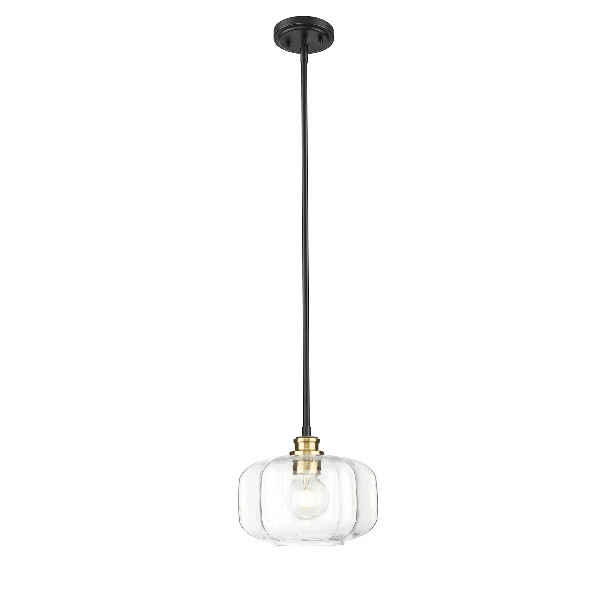 Shown in Matte Black And Brass finish and Clear Glass Globe shade