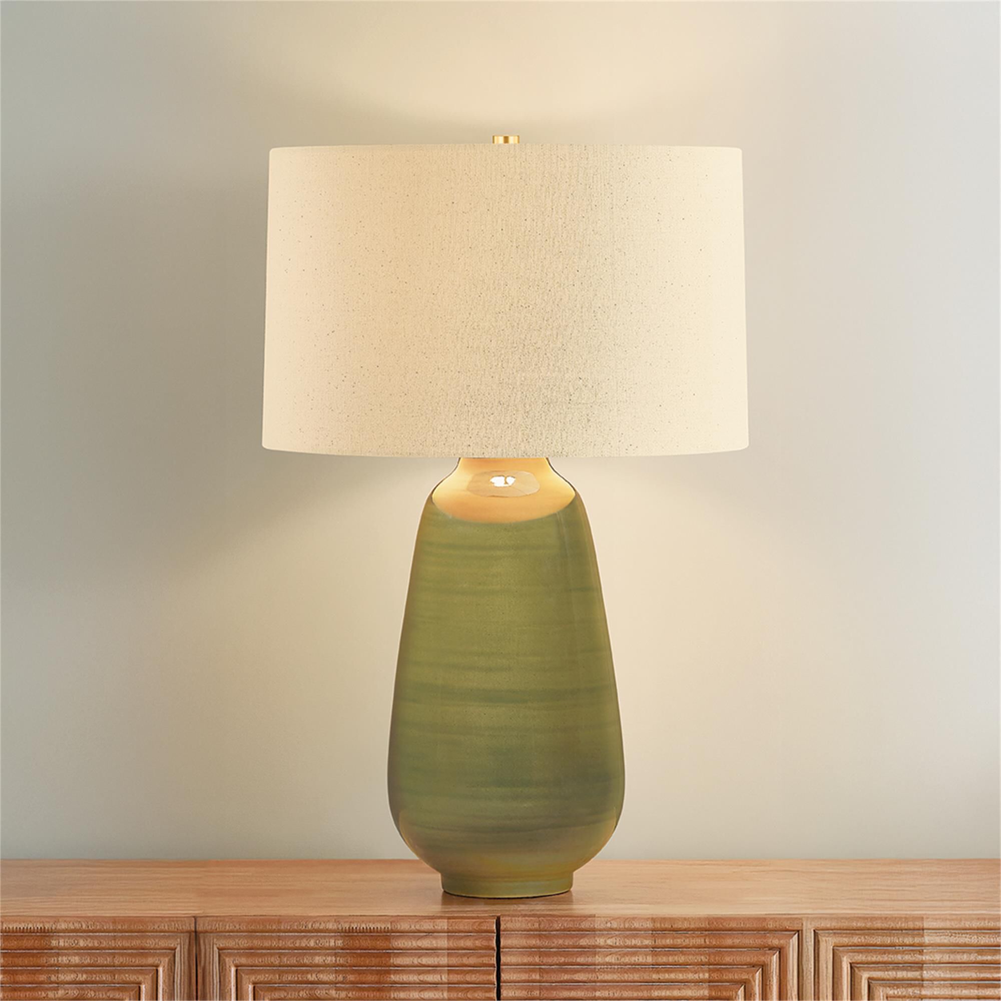 Shown in Aged Brass and Ceramic Dark Forrest finish and Wheat Linen shade