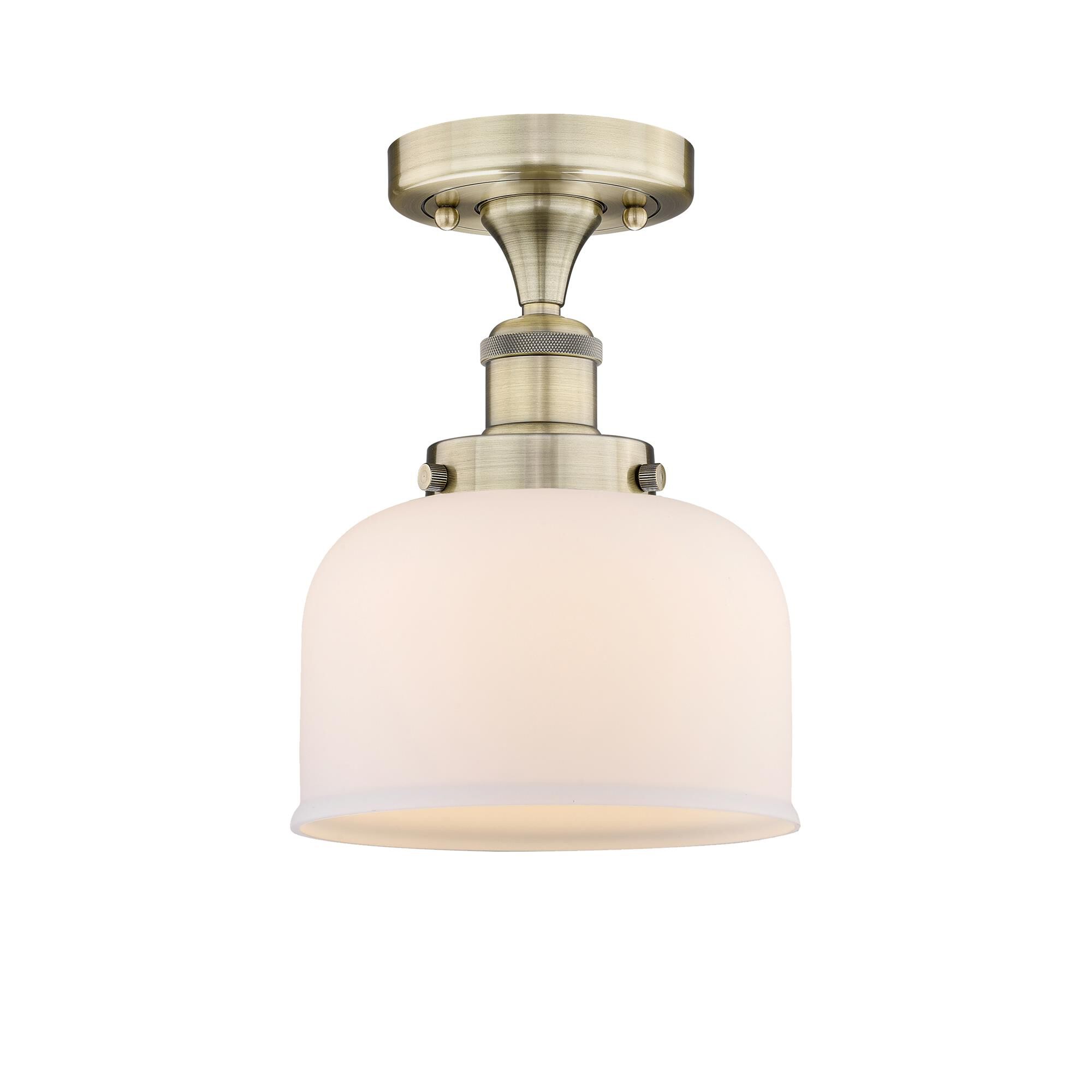 Shown in Antique Brass finish and Matte White glass