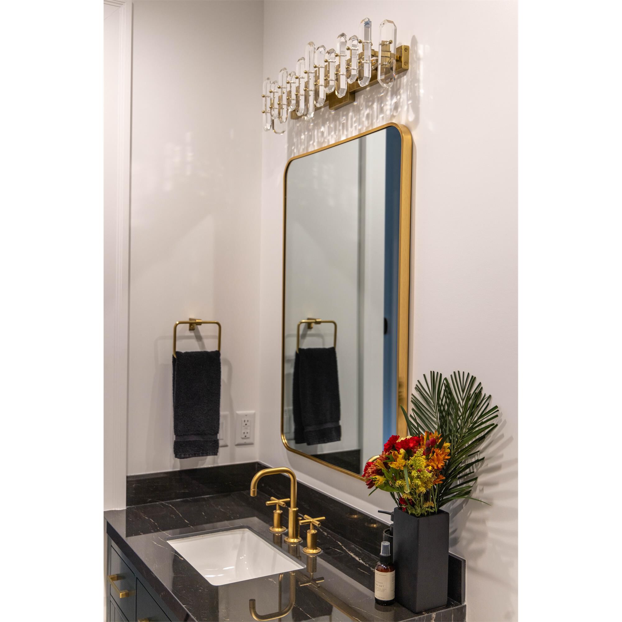 Shown in Aged Brass finish and Faceted Crystal Elements crystal