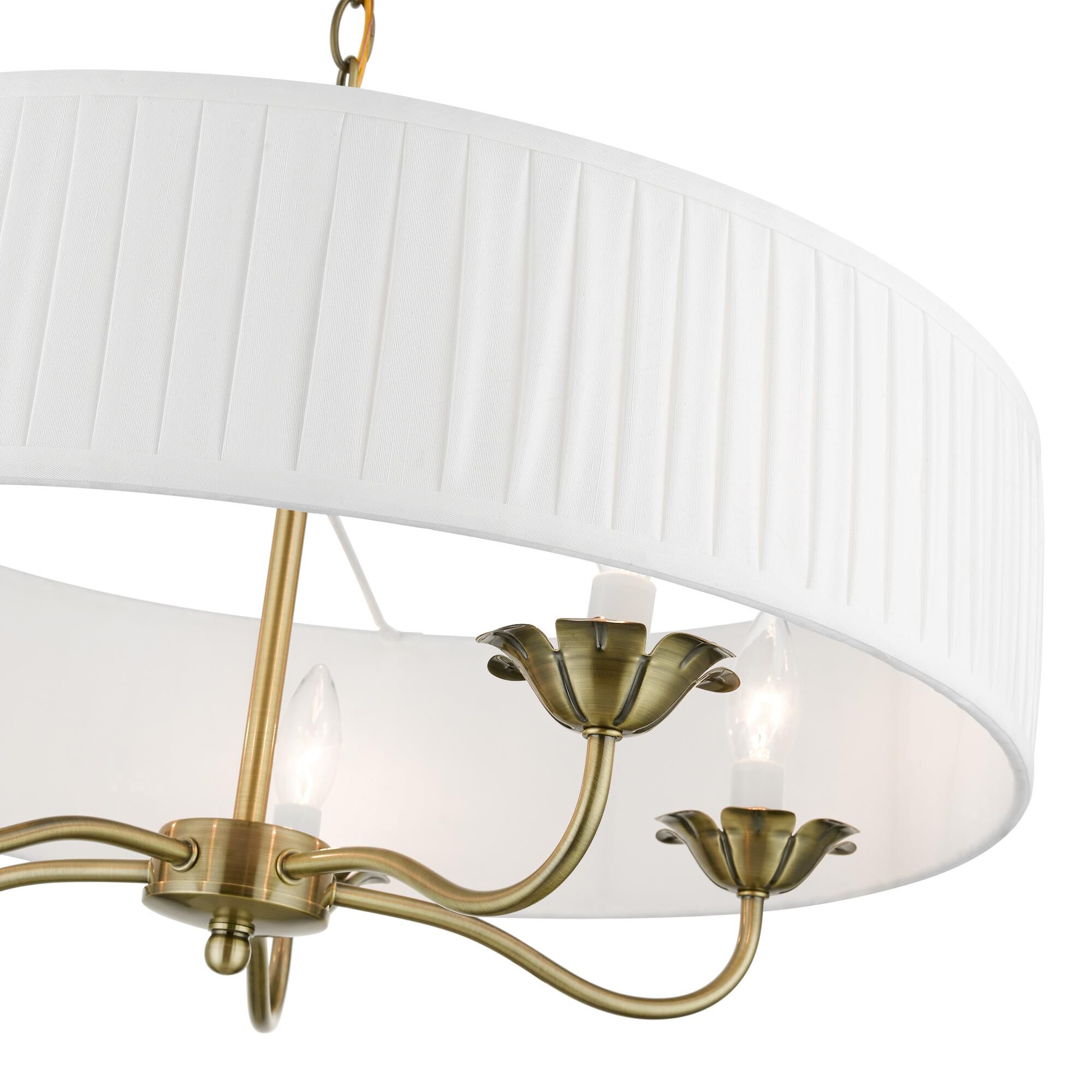 Shown in Antique Brass finish and Off-White Fabric Hardback with White Fabric Inside shade