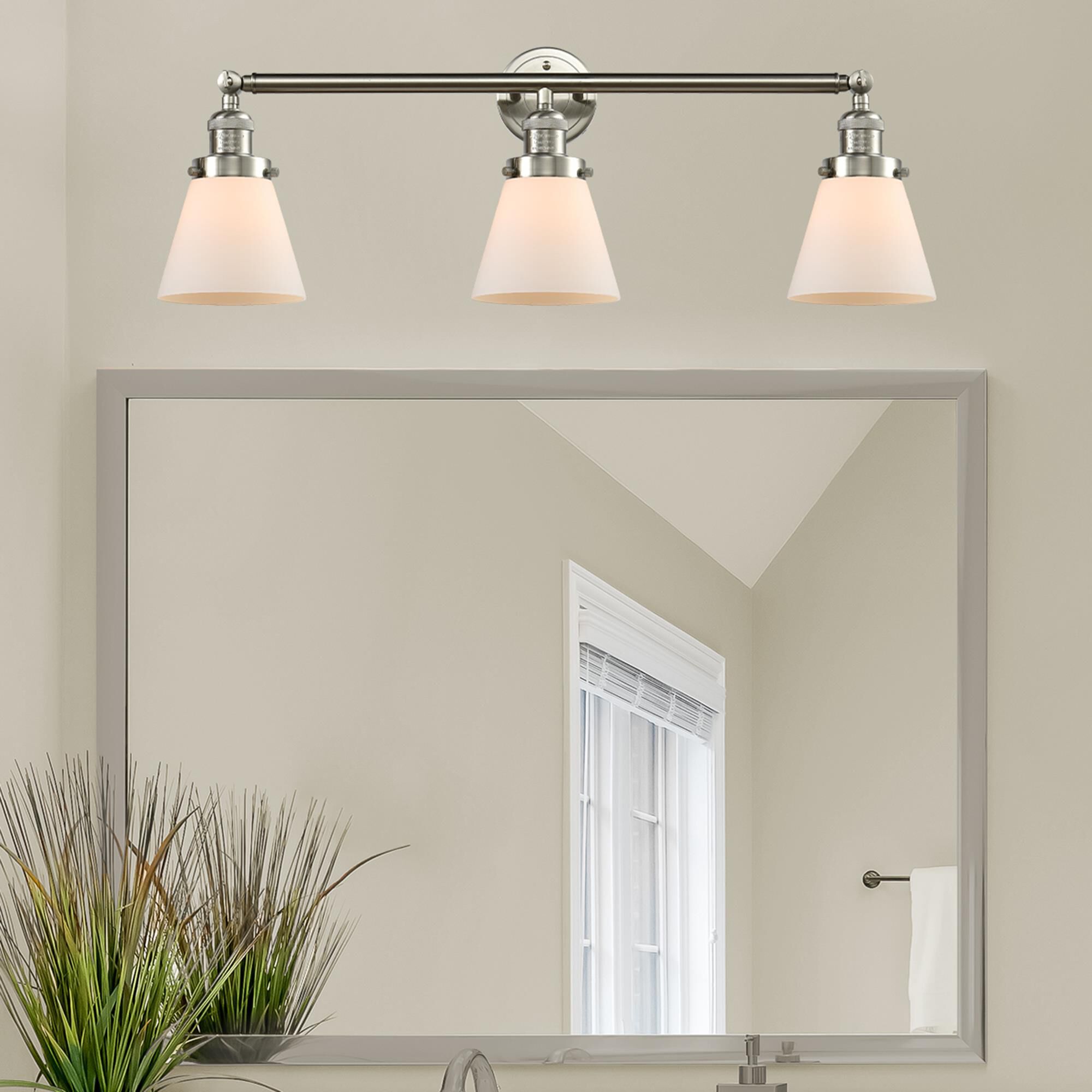 Shown in Brushed Satin Nickel finish and Matte White Cased glass