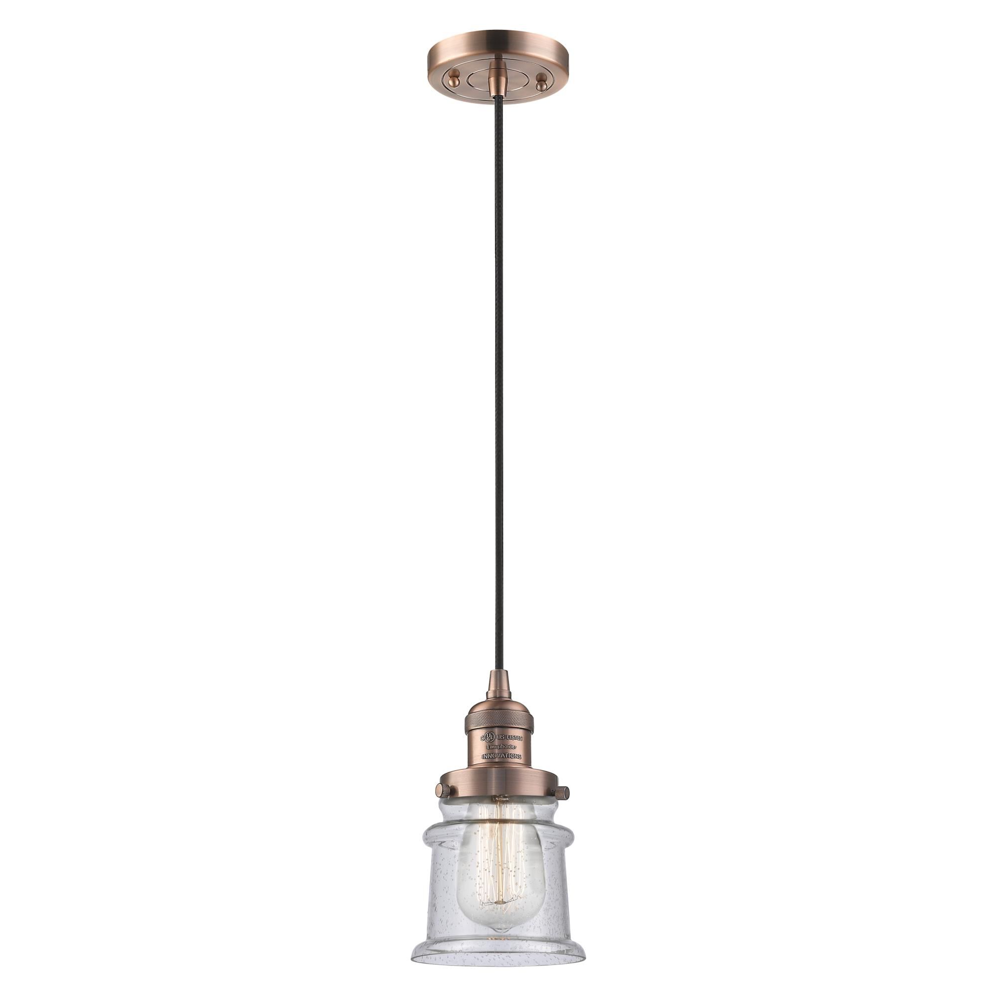 Shown in Antique Brass finish and Matte White Halophane - Cone glass and Black Textured Cord accent