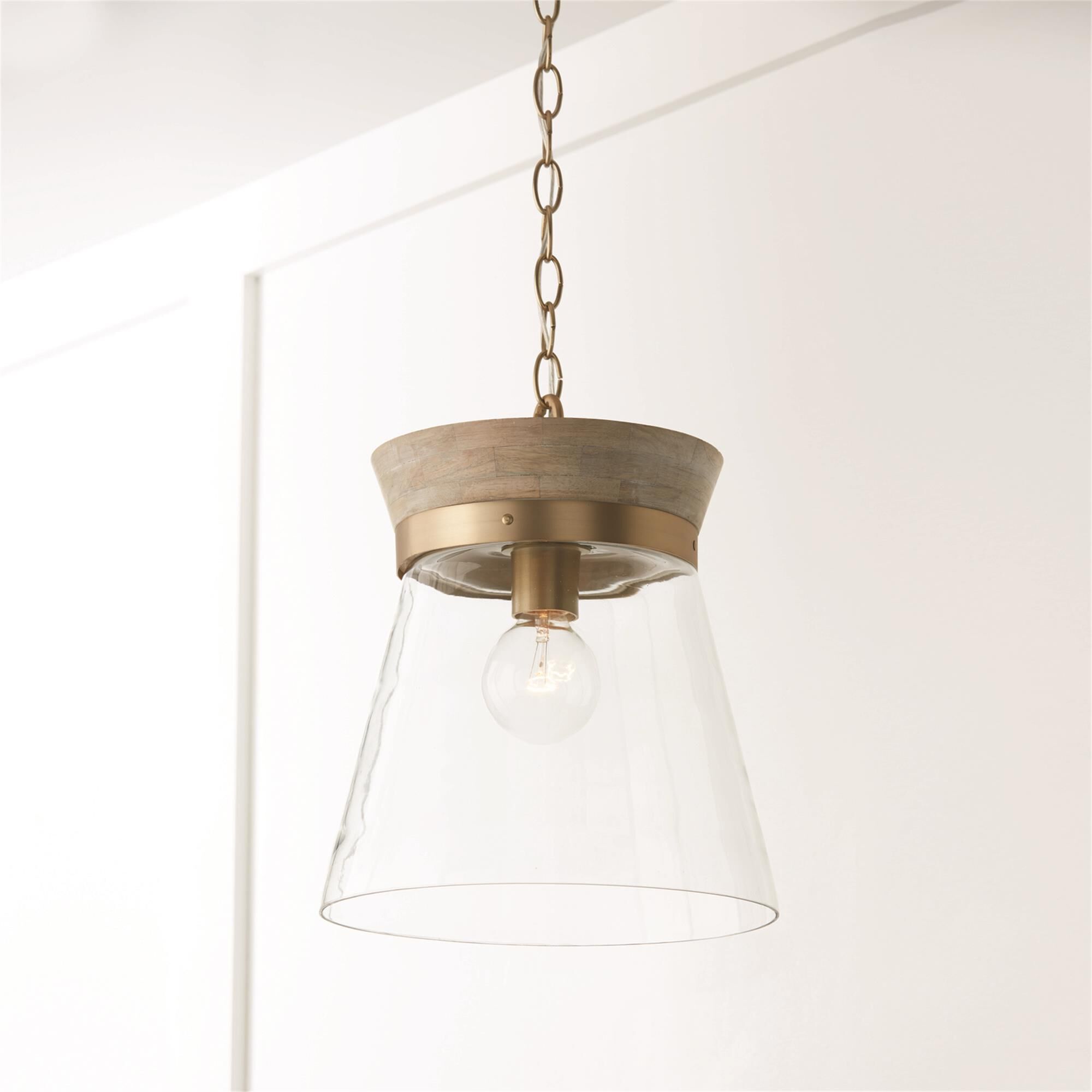 Shown in White Wash and Matte Brass finish and Clear glass