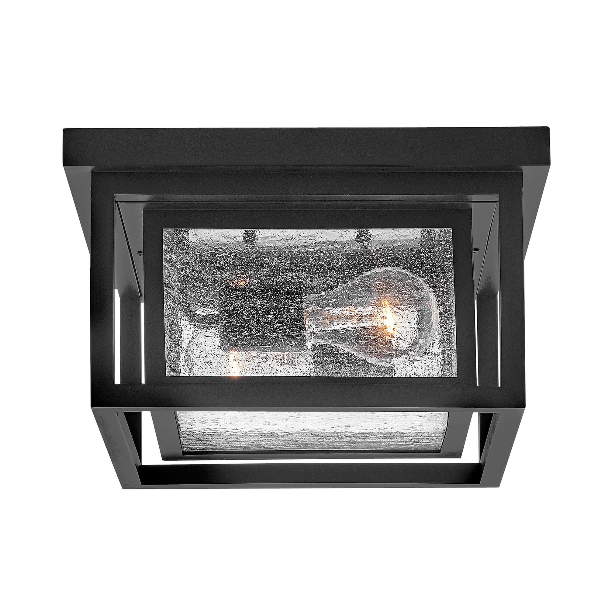 Shown in Black finish and Clear Seedy glass
