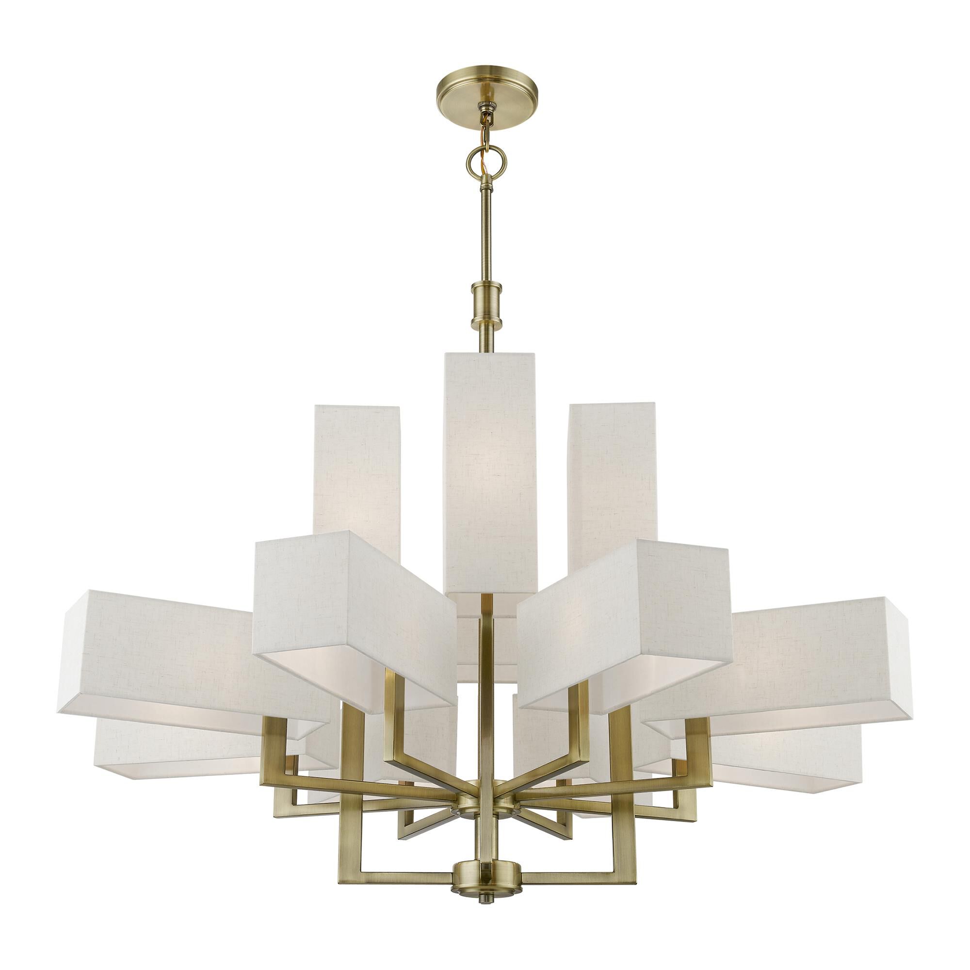 Shown in Antique Brass finish and Hand Crafted Oatmeal Color Hardback Fabric With White Fabric Inside shade