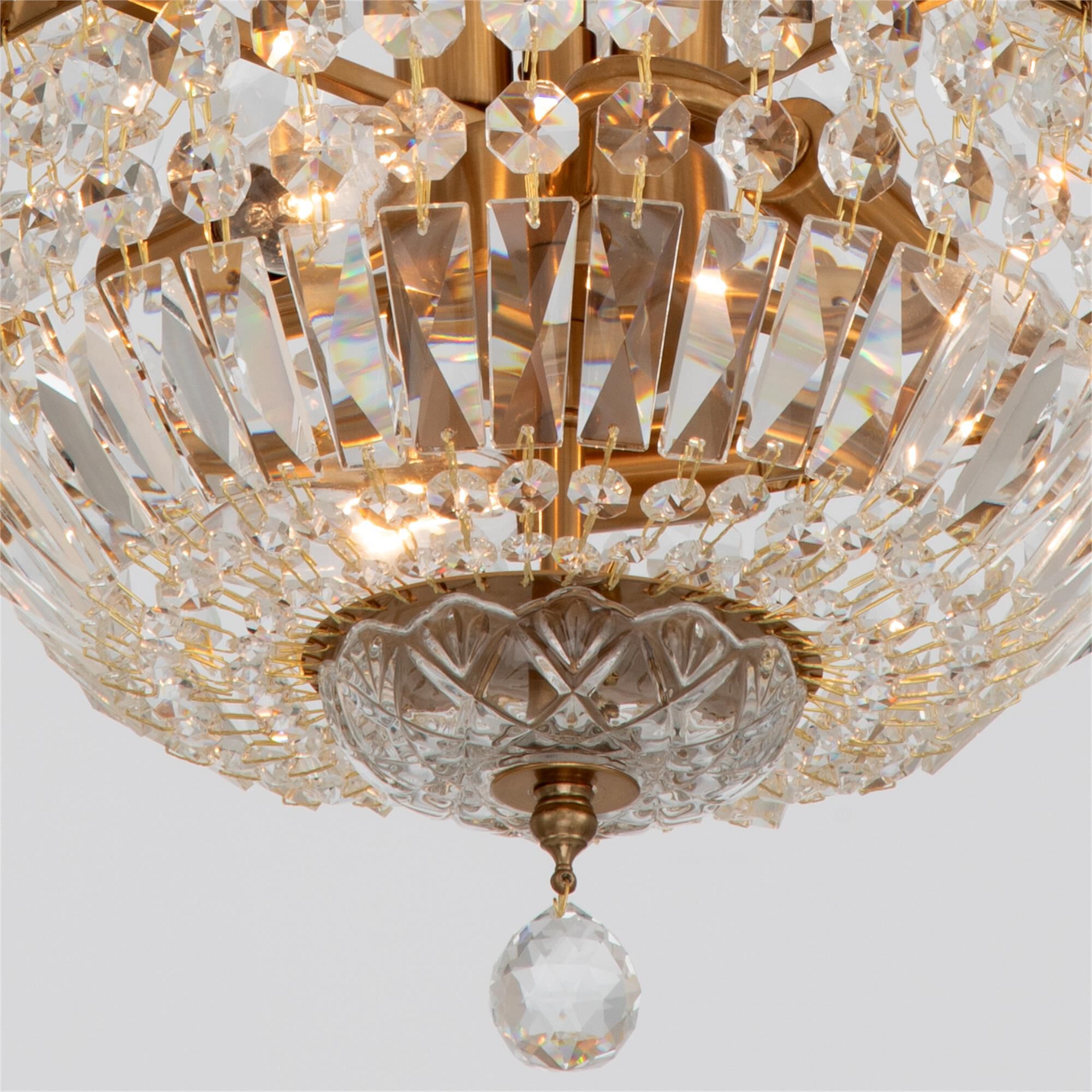 Shown in Aged Brass finish and Hand Cut crystal