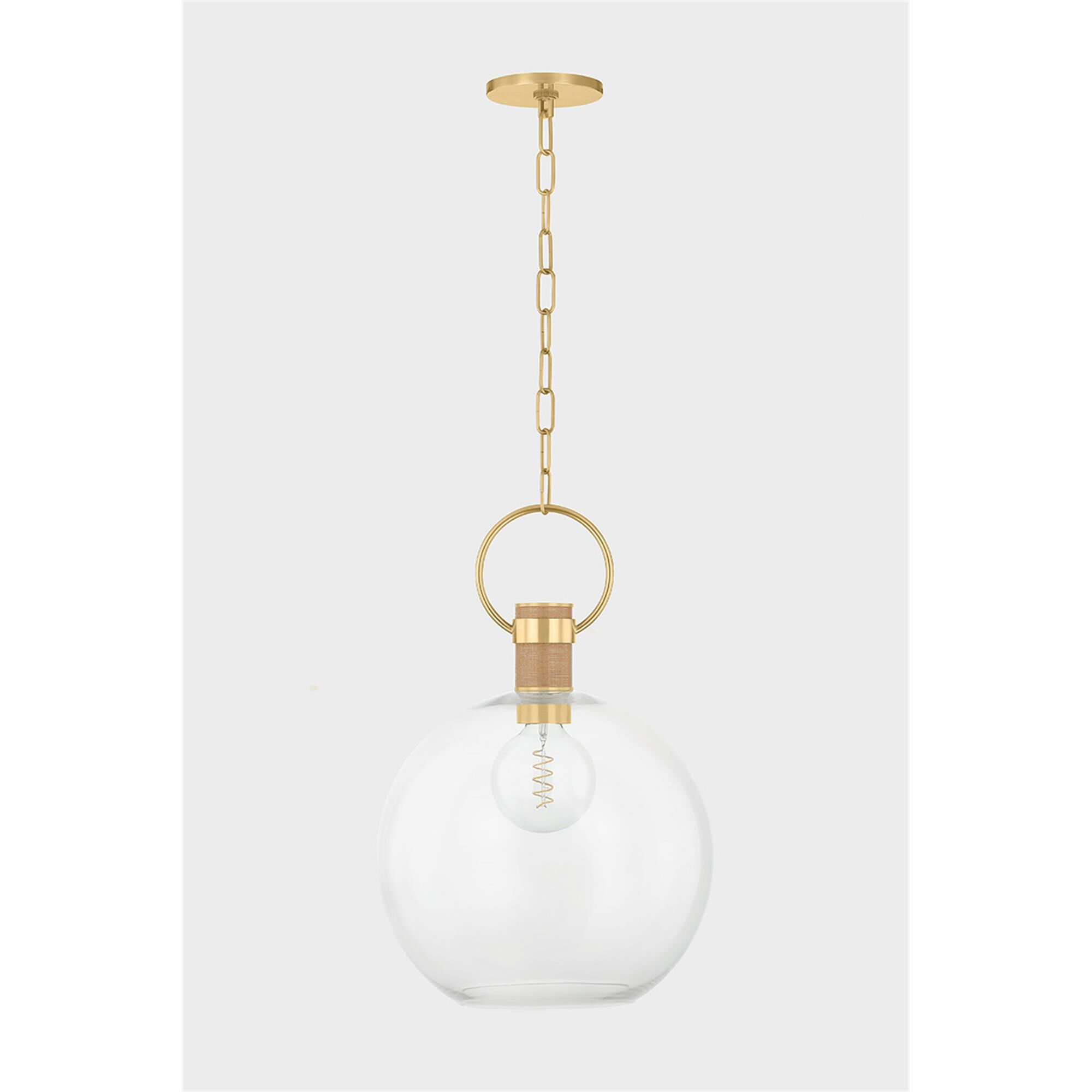 Shown in Aged Brass finish and Clear shade