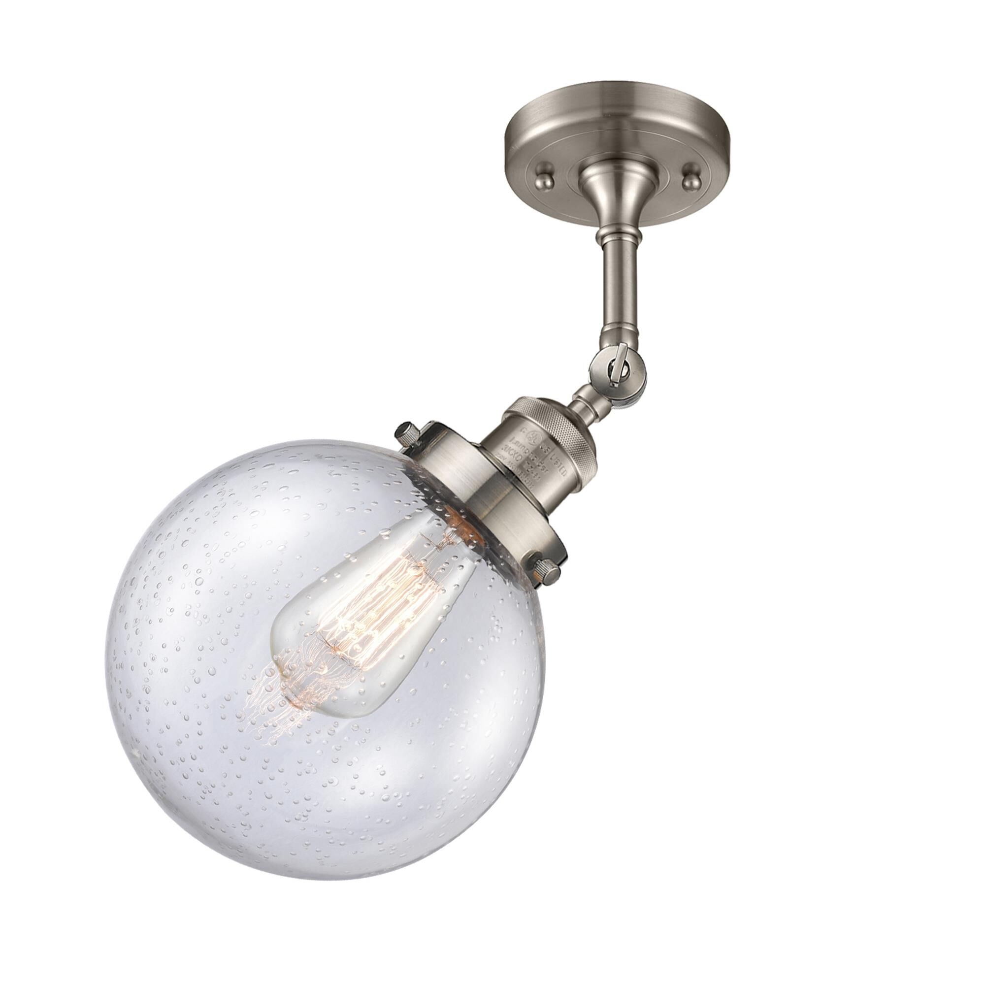 Shown in Brushed Satin Nickel finish and Seedy glass and No Accent accent