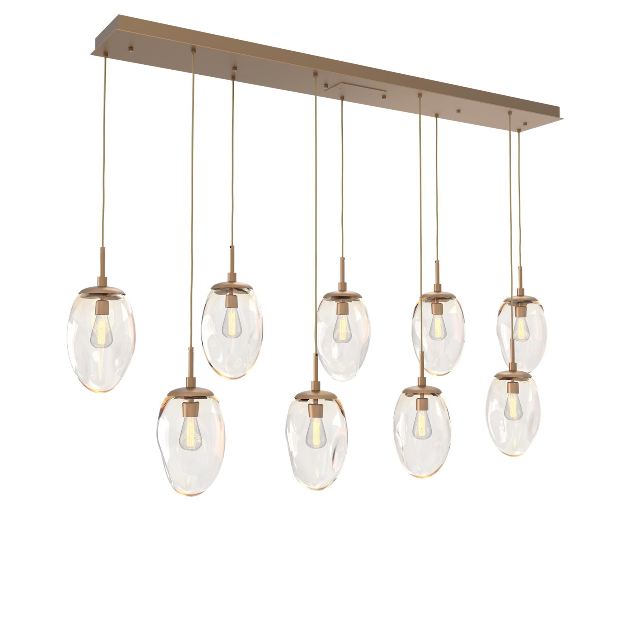 Shown in Novel Brass finish and Amber Blown glass