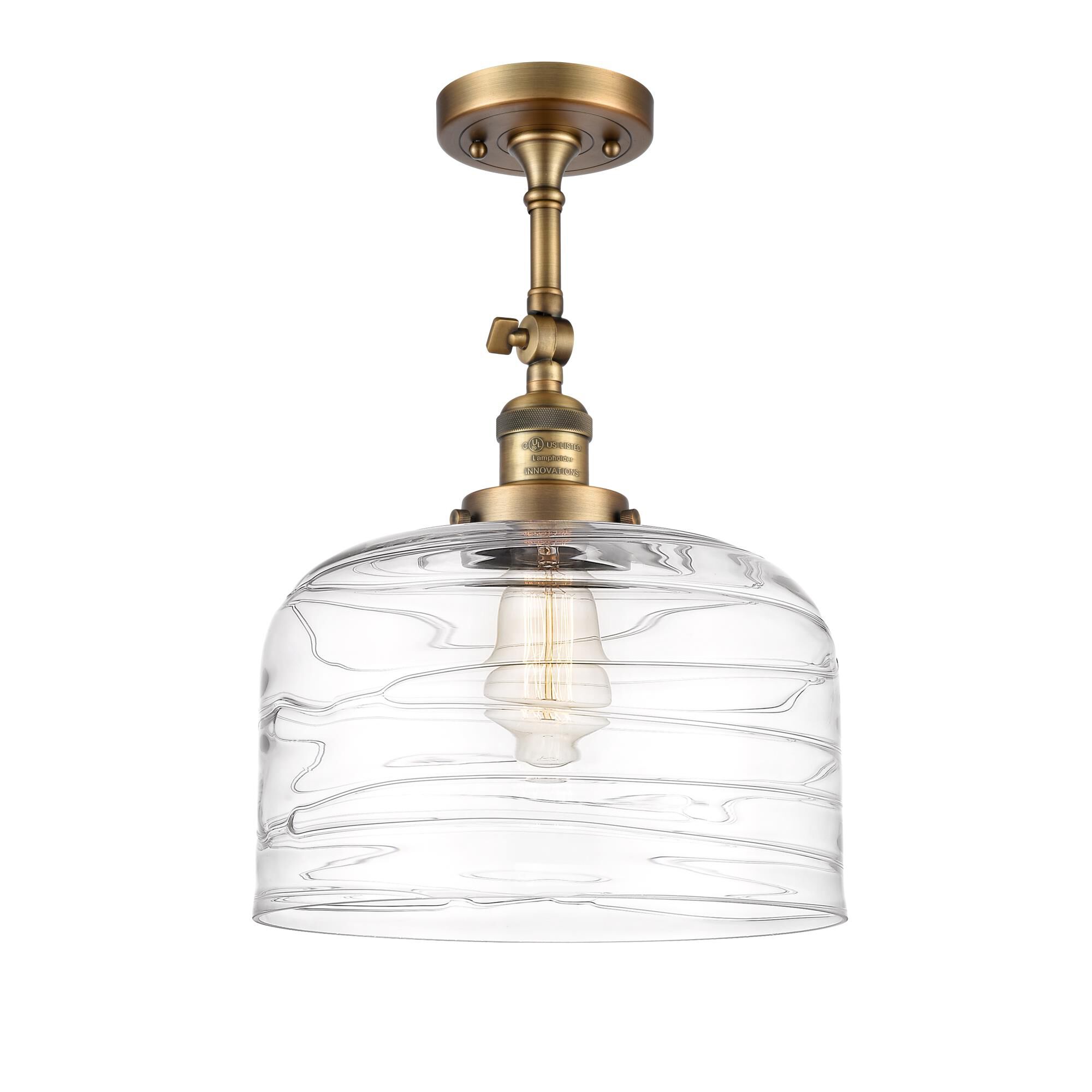 Shown in Brushed Brass finish and Clear Deco Swirl X-Large Bell glass