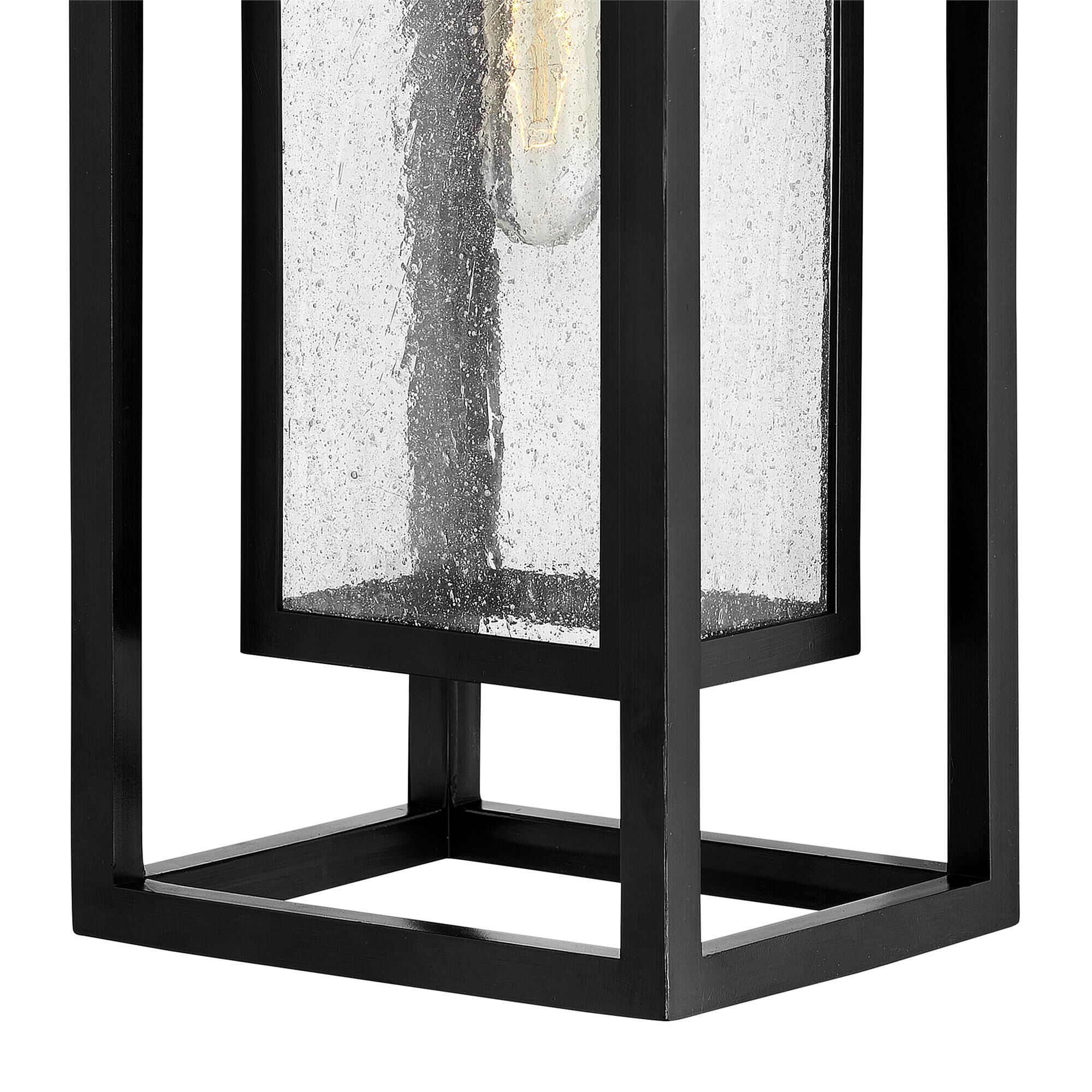 Shown in Black finish and Clear Seedy glass