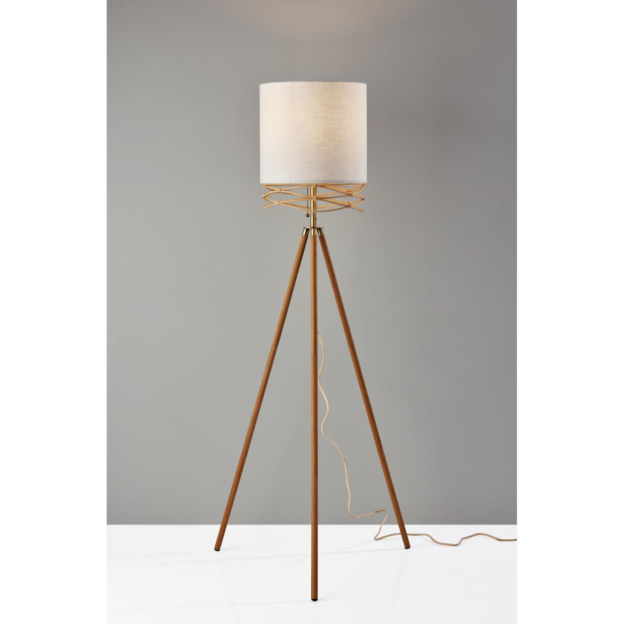 Shown in Natural Wood Veneer & Antique Brass Accents finish and White Textured Fabric shade