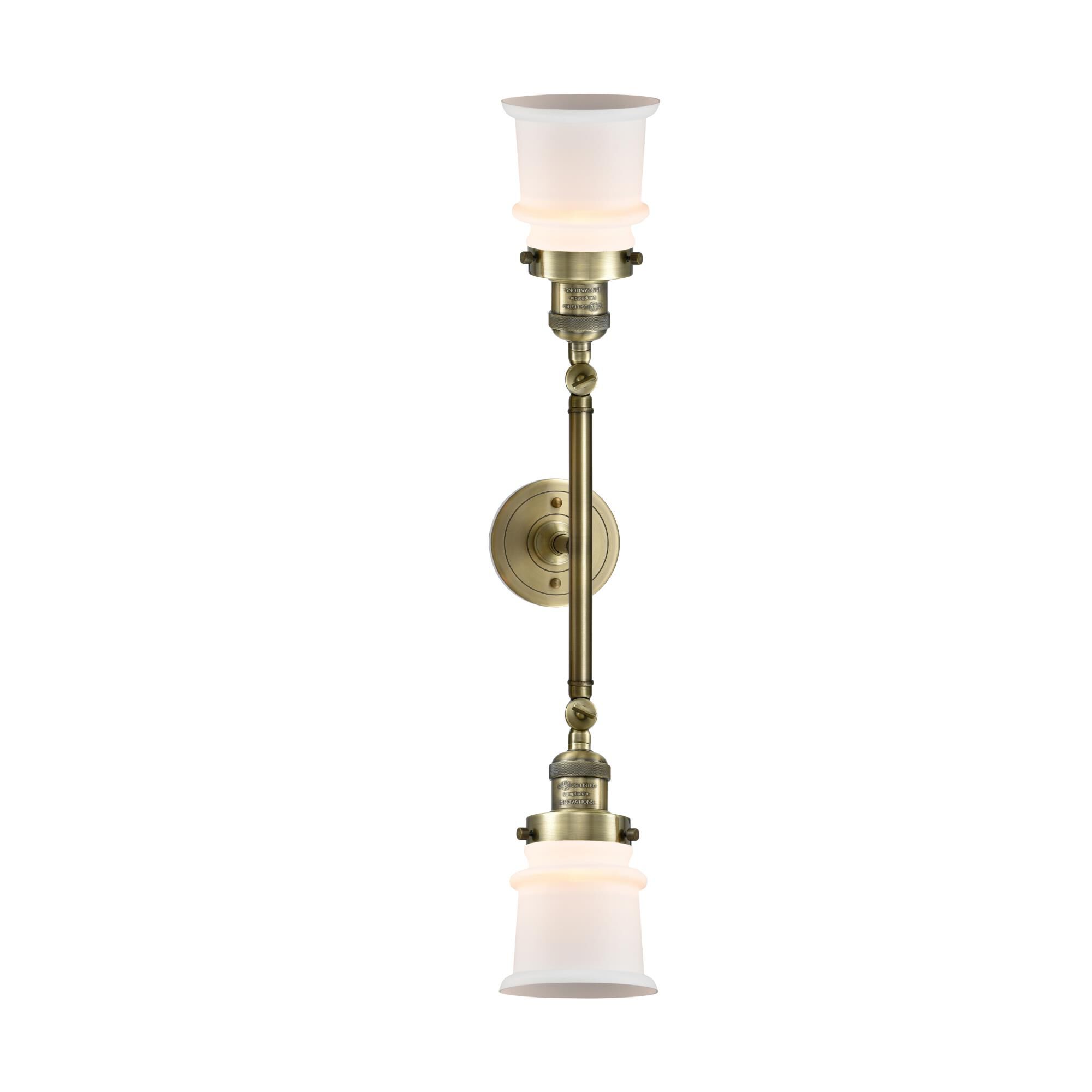 Shown in Antique Brass finish and Matte White Cased glass