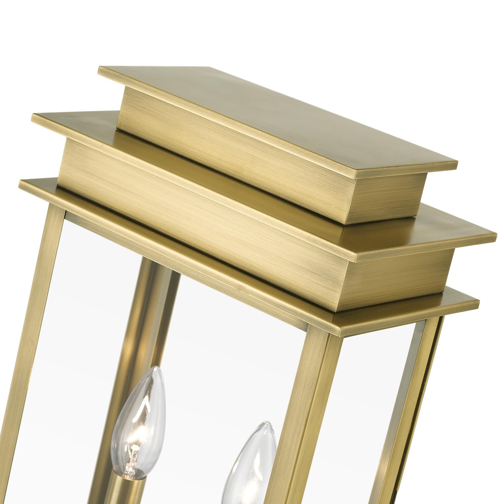 Shown in Antique Brass with Polished Chrome Stainless Steel Reflector finish and Clear glass