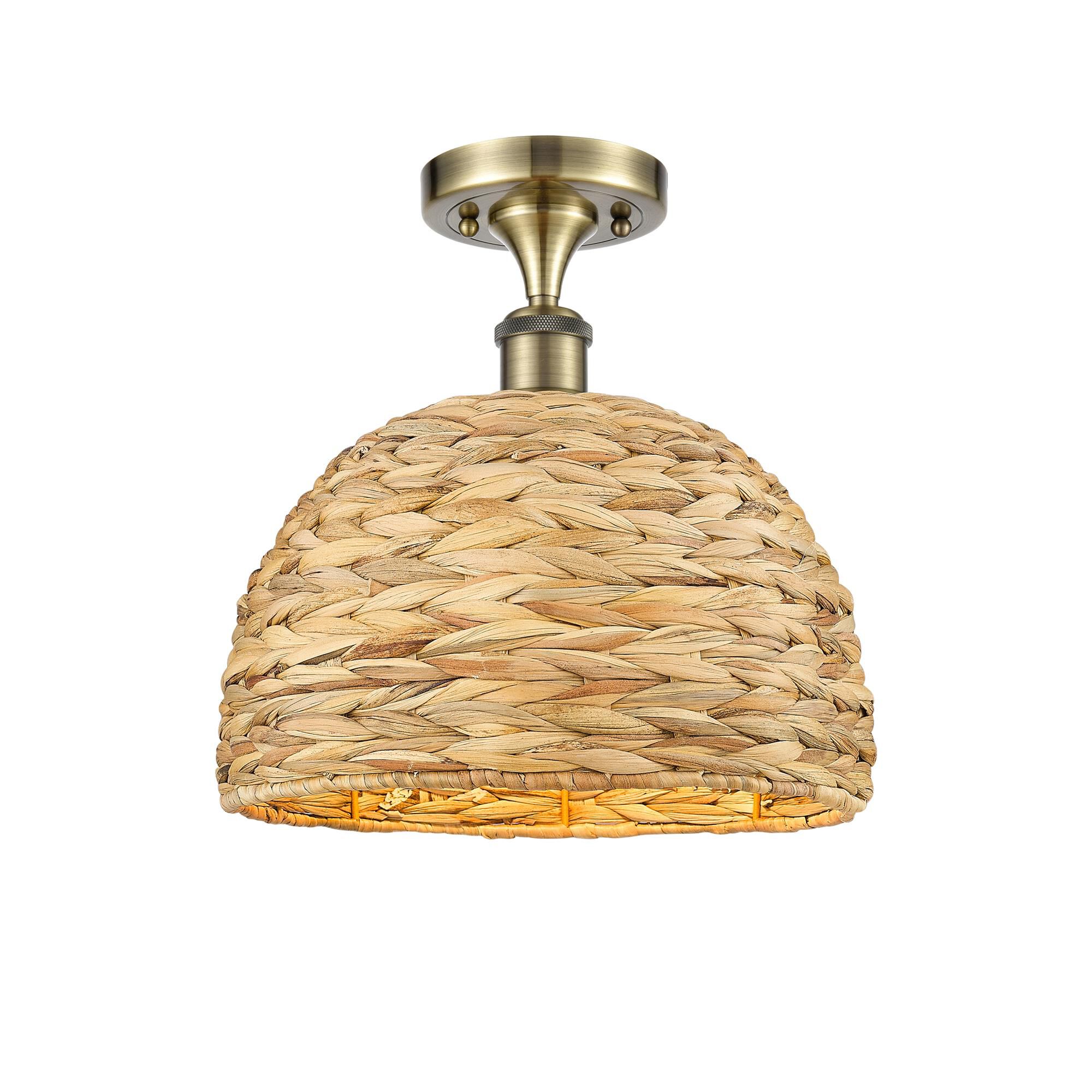 Shown in Antique Brass finish and Natural shade