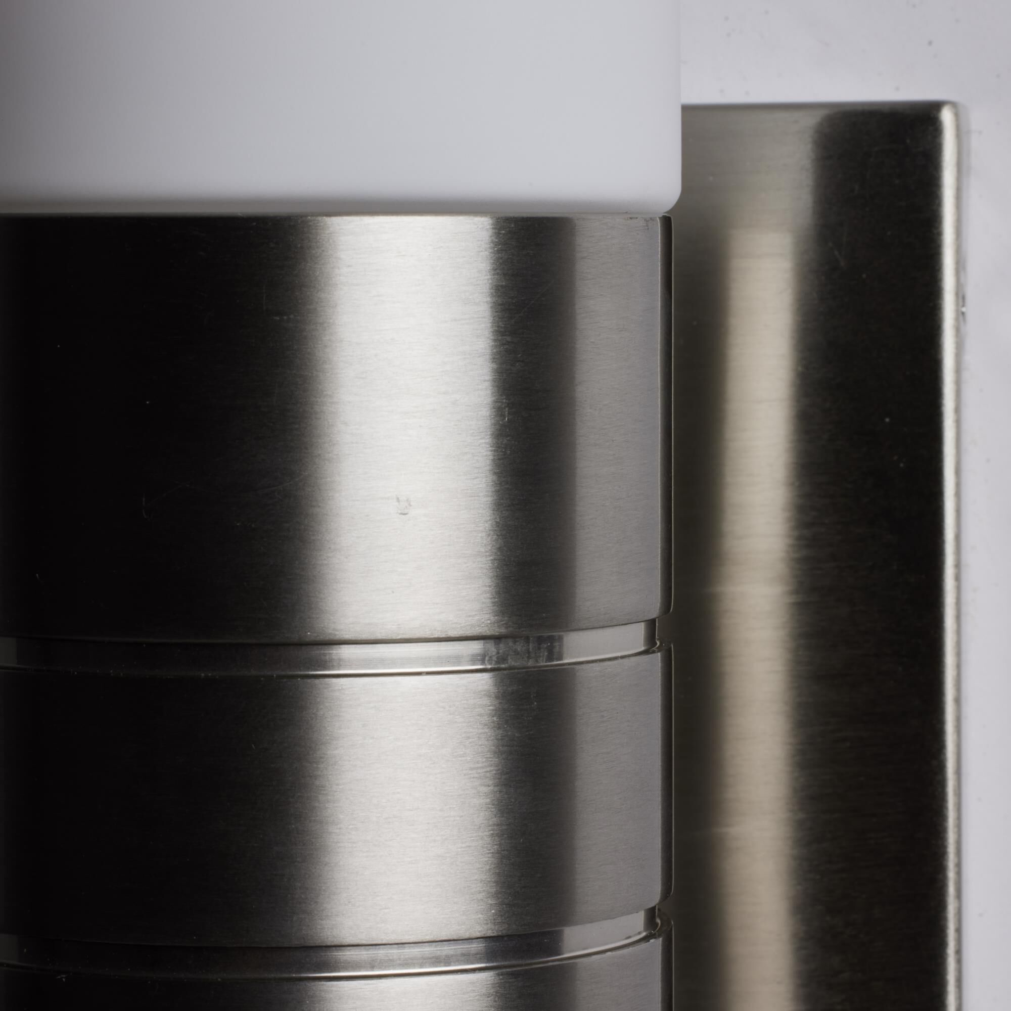 Shown in Brushed Nickel finish and White glass