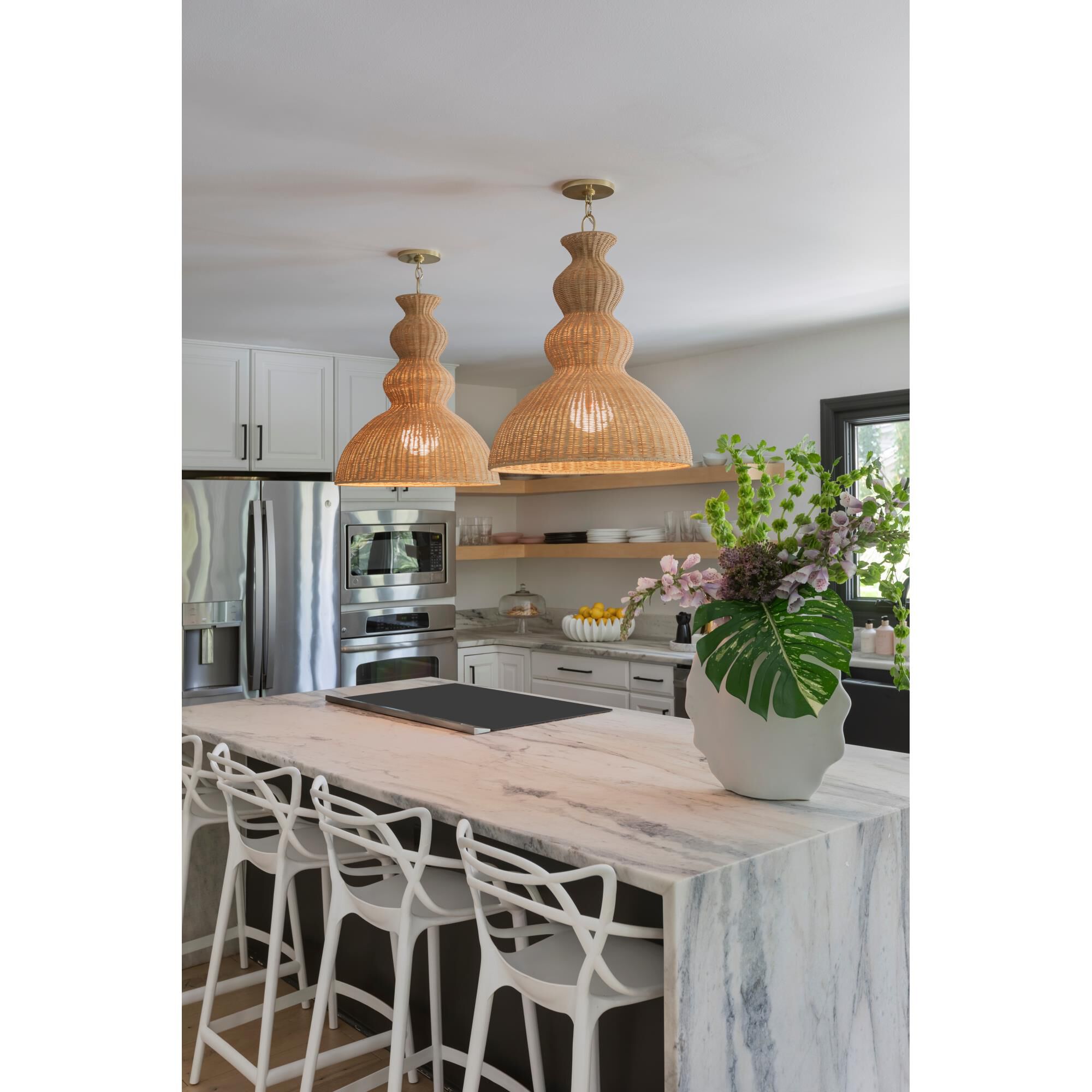 Shown in Aged Brass finish and Natural Woven shade