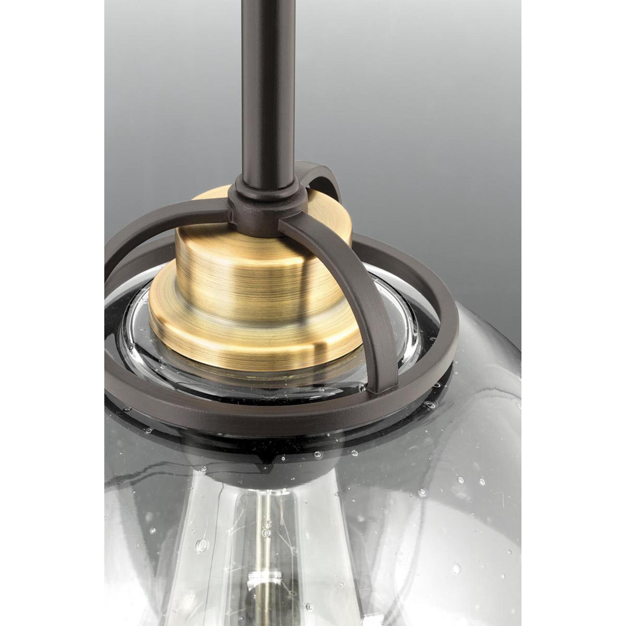 Shown in Antique Bronze finish and Clear Seeded White Opal glass