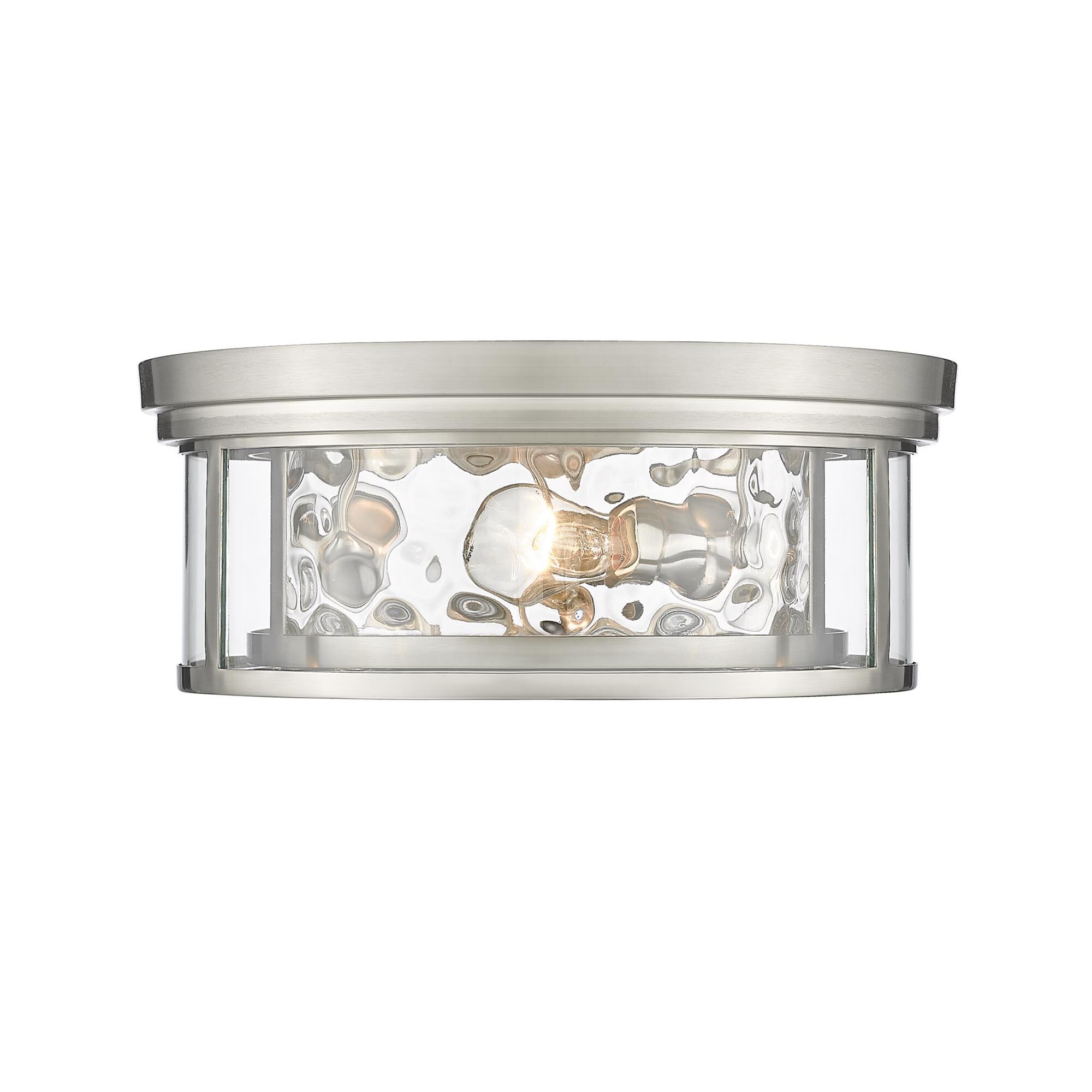 Shown in Brushed Nickel finish and Glass shade