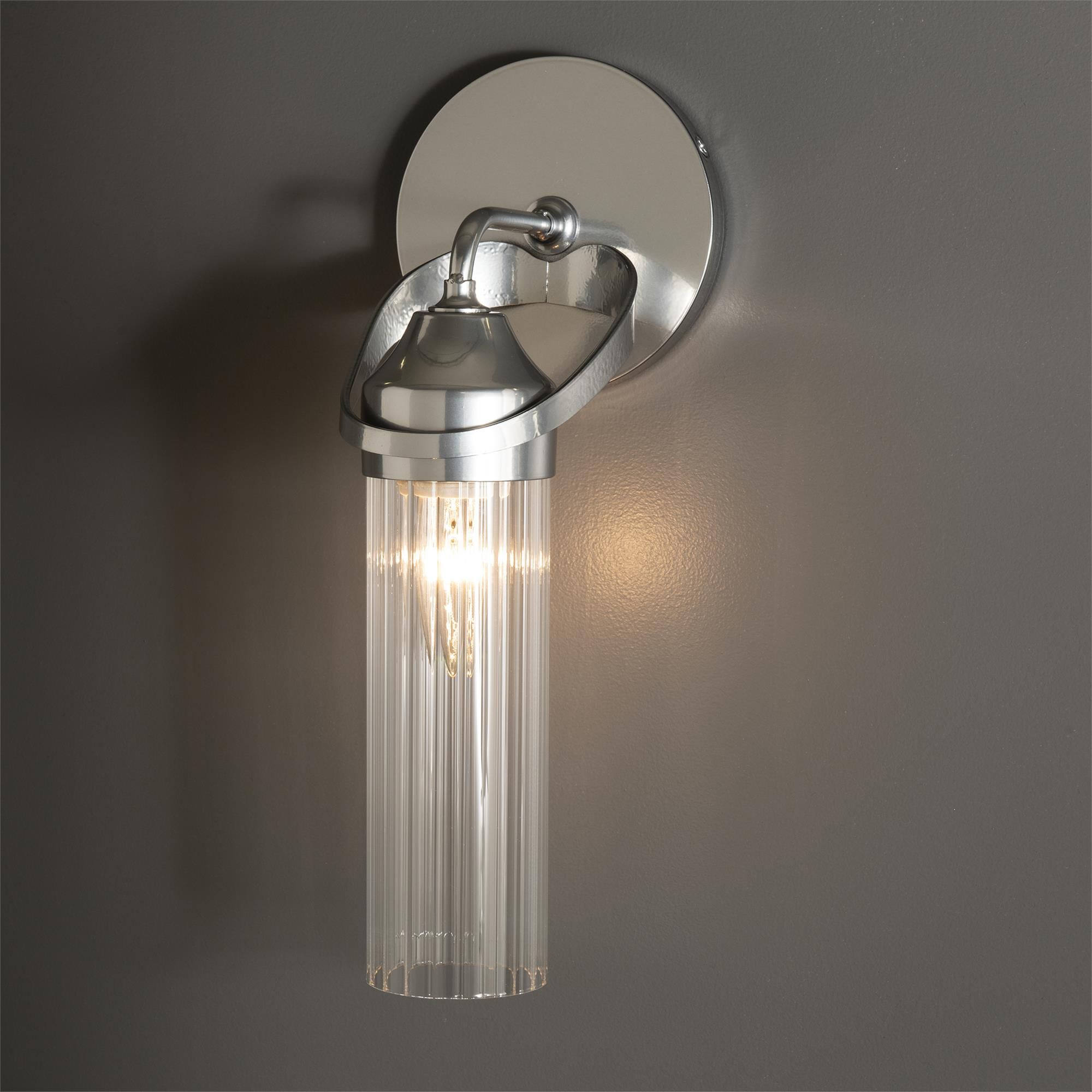 Shown in Sterling finish and Clear Fluted glass