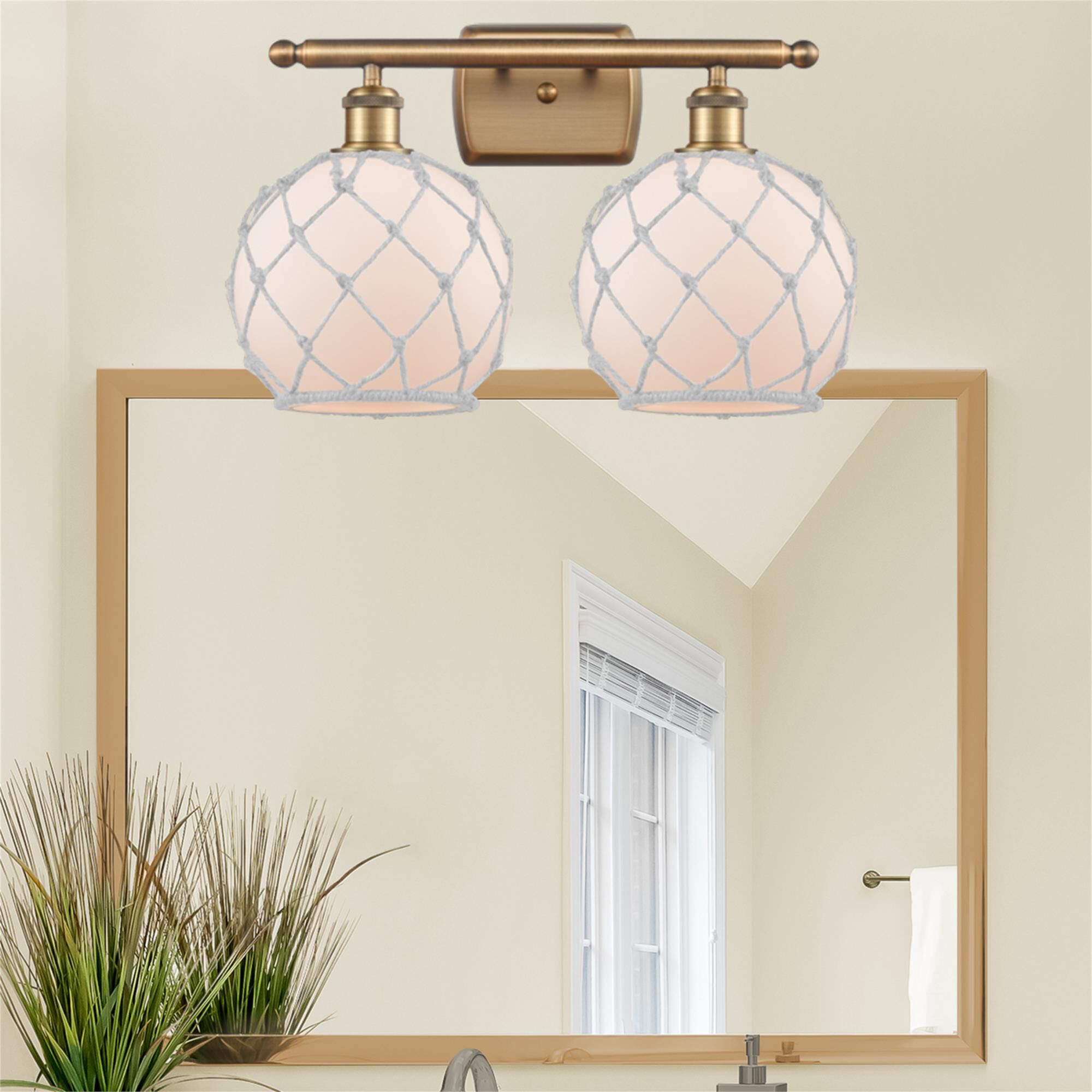 Shown in Brushed Brass finish and White glass and White Rope accent