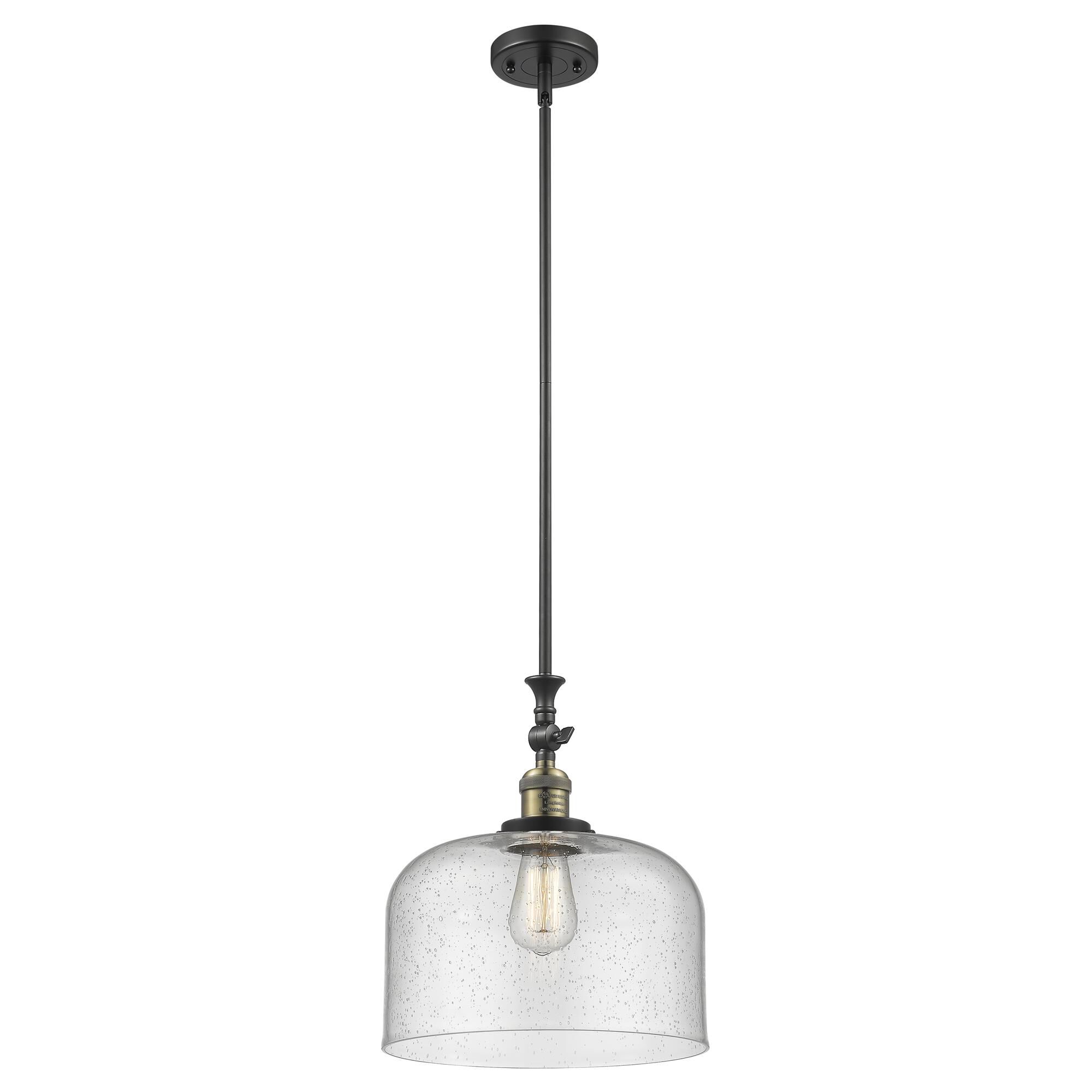 Shown in Black Antique Brass finish and Seedy glass