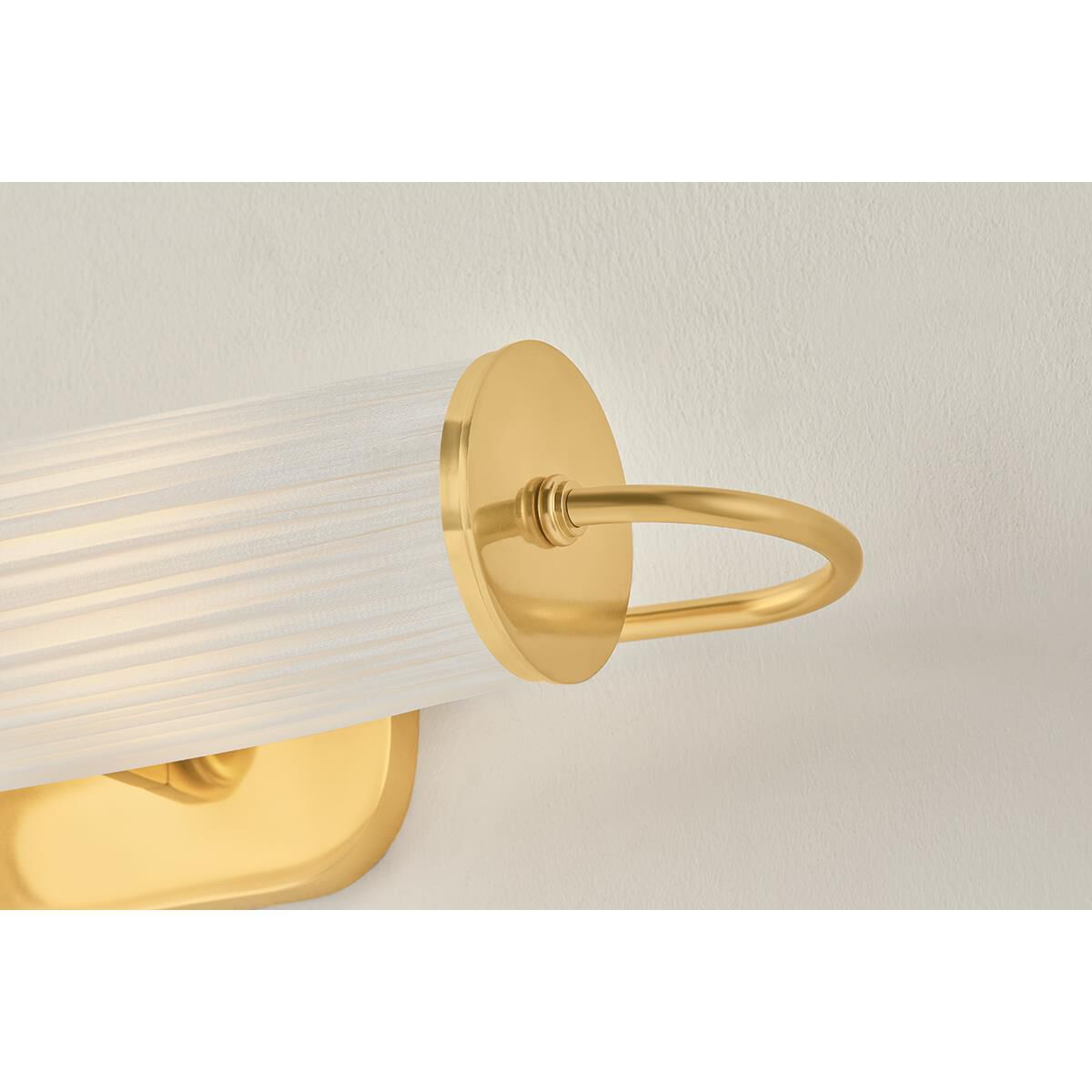 Shown in Aged Brass finish and Ivory Silk shade