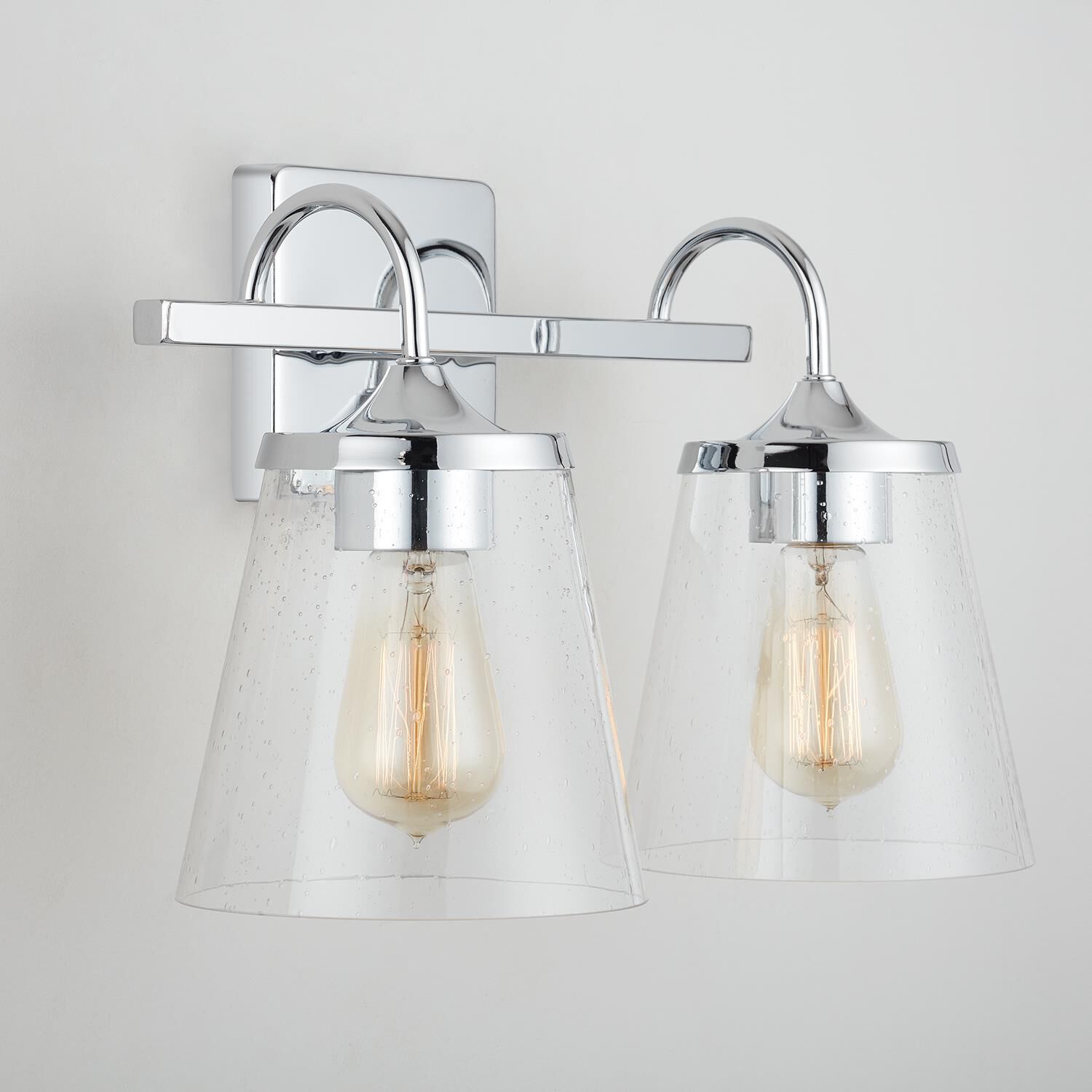 Shown in Chrome finish and Clear Seeded glass