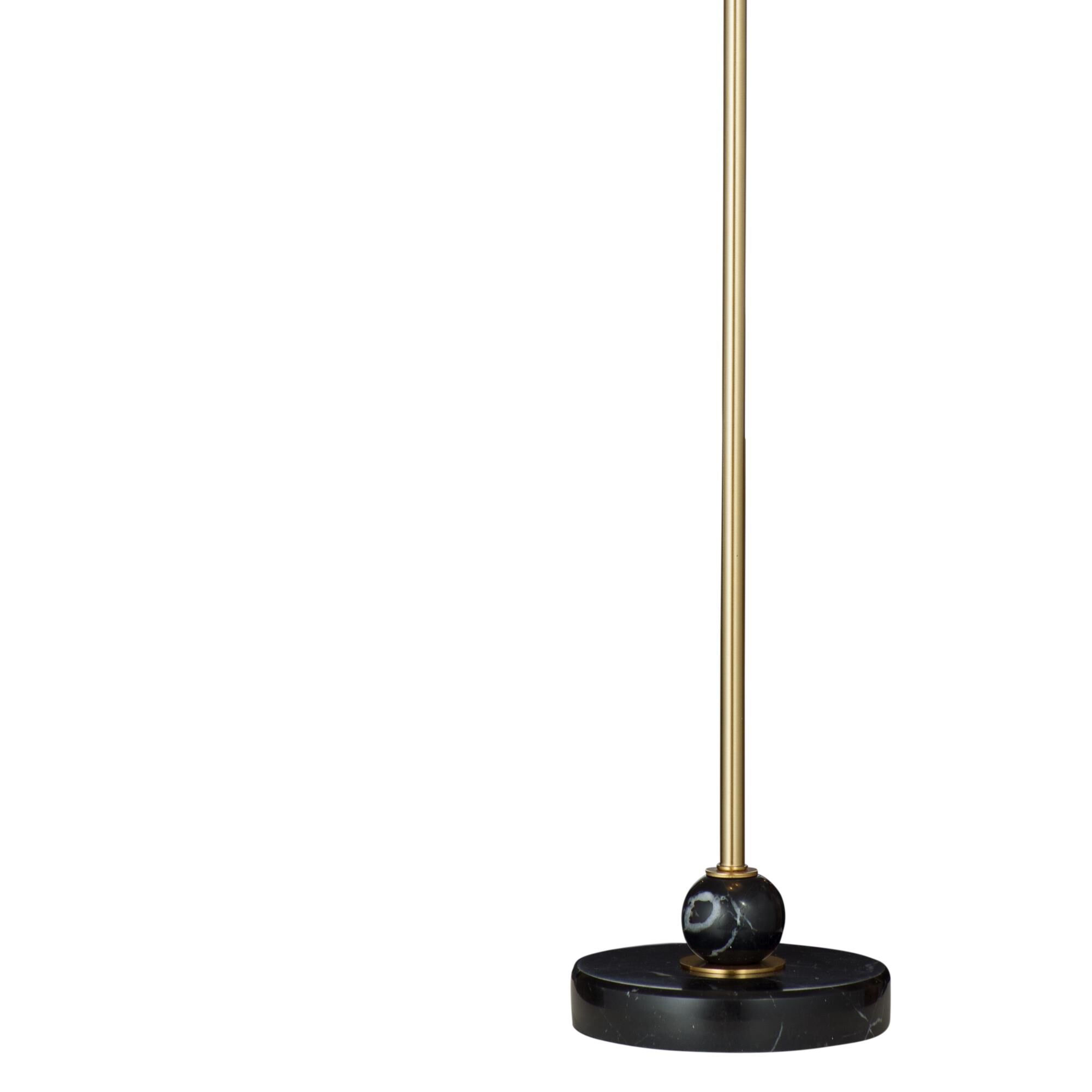 Shown in Brass finish and White shade