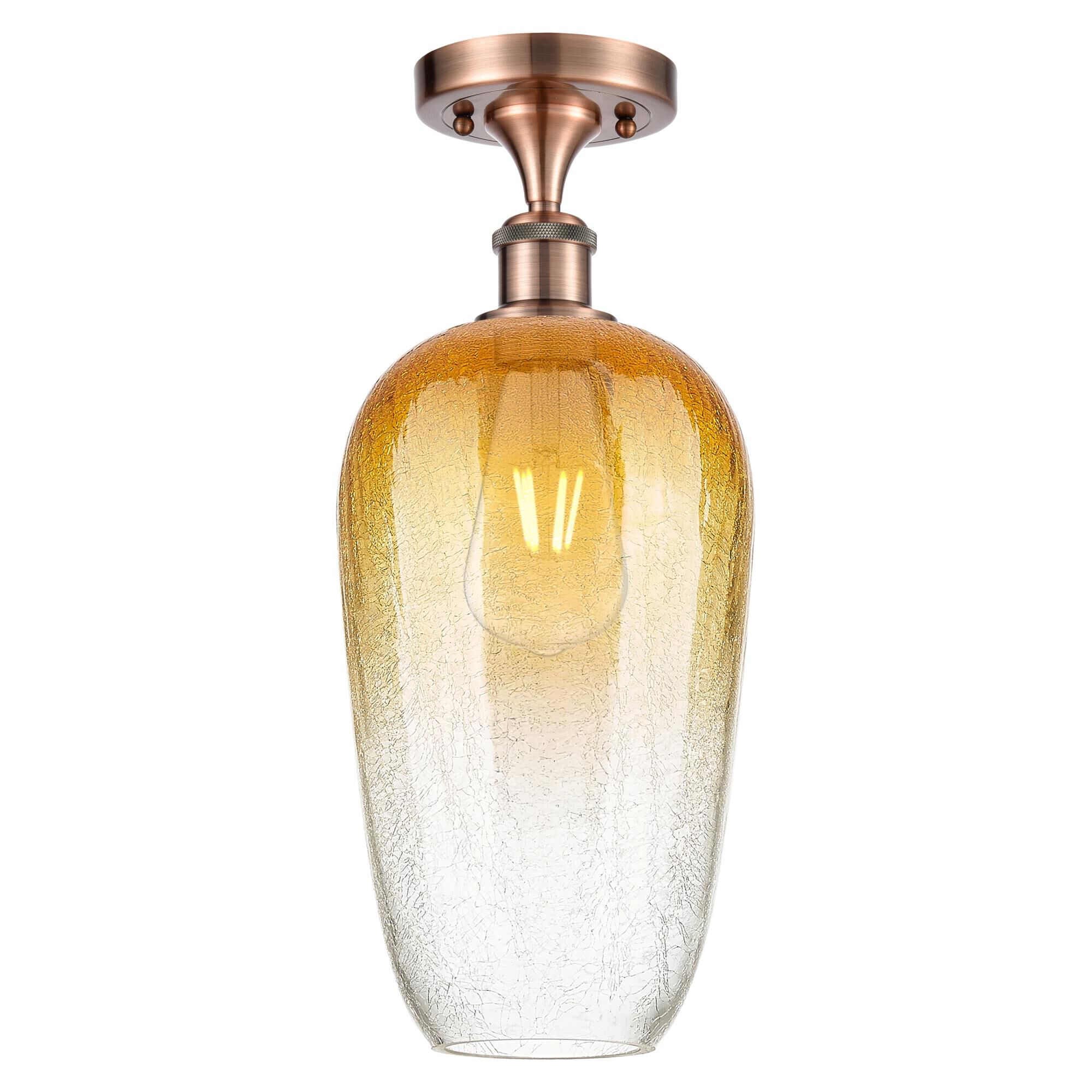 Shown in Antique Copper finish and Amber glass