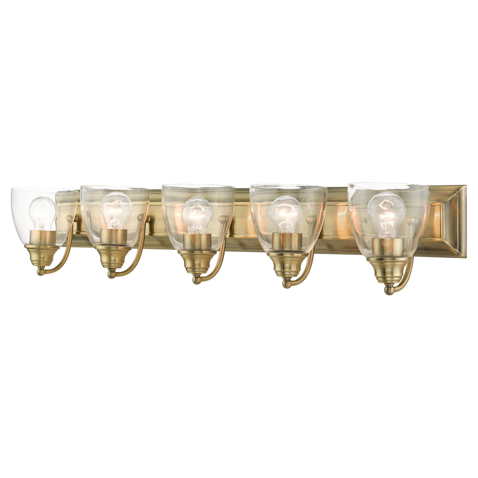 Shown in Antique Brass finish and Hand Blown Clear glass
