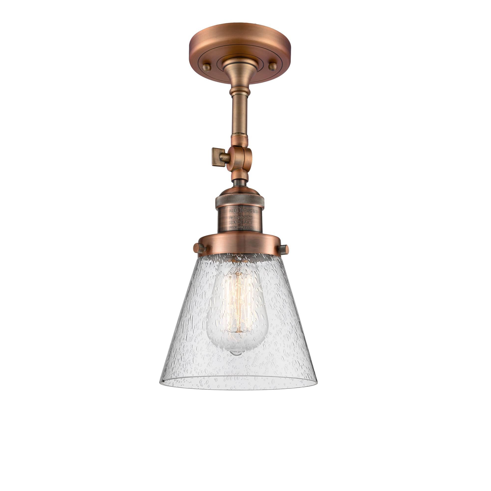Shown in Antique Copper finish and Seedy glass and None accent