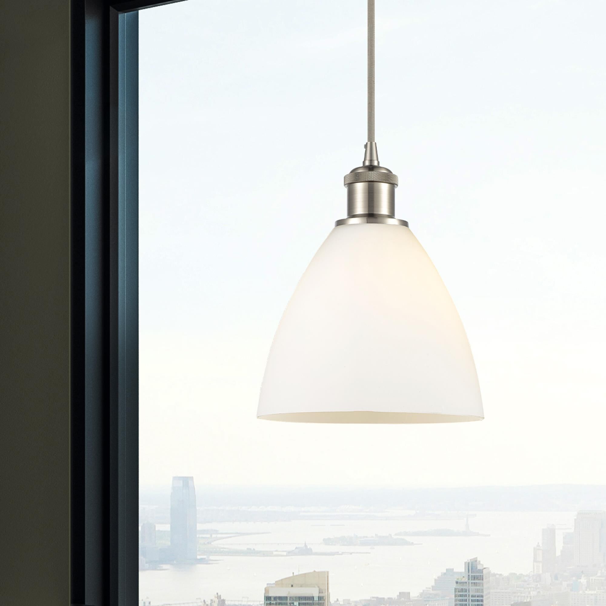Shown in Brushed Satin Nickel finish and Matte White glass