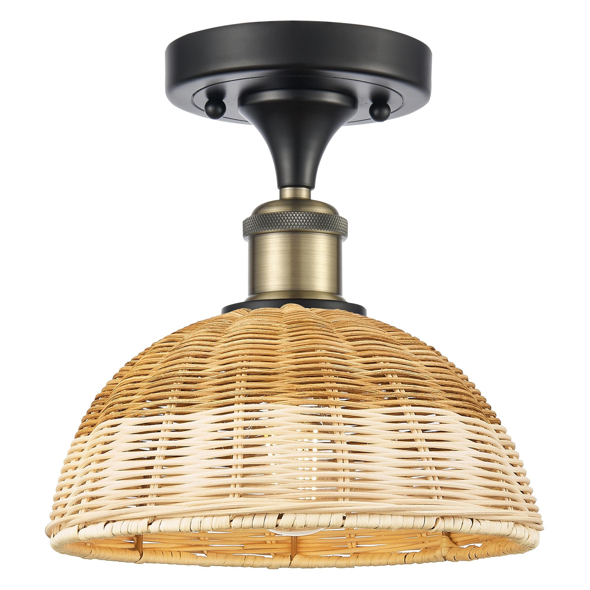 Shown in Black Antique Brass finish and Natural shade