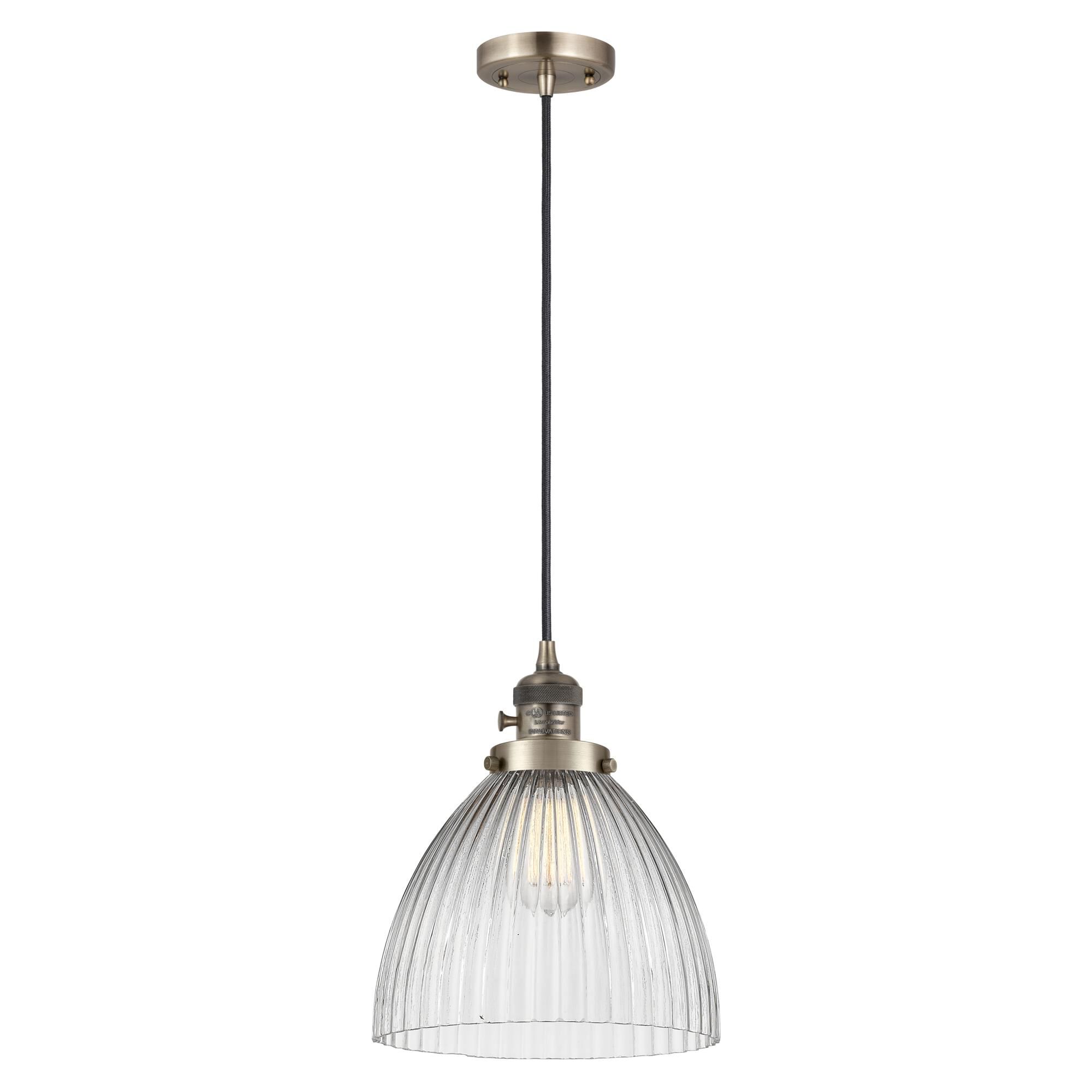 Shown in Antique Brass finish and Clear glass