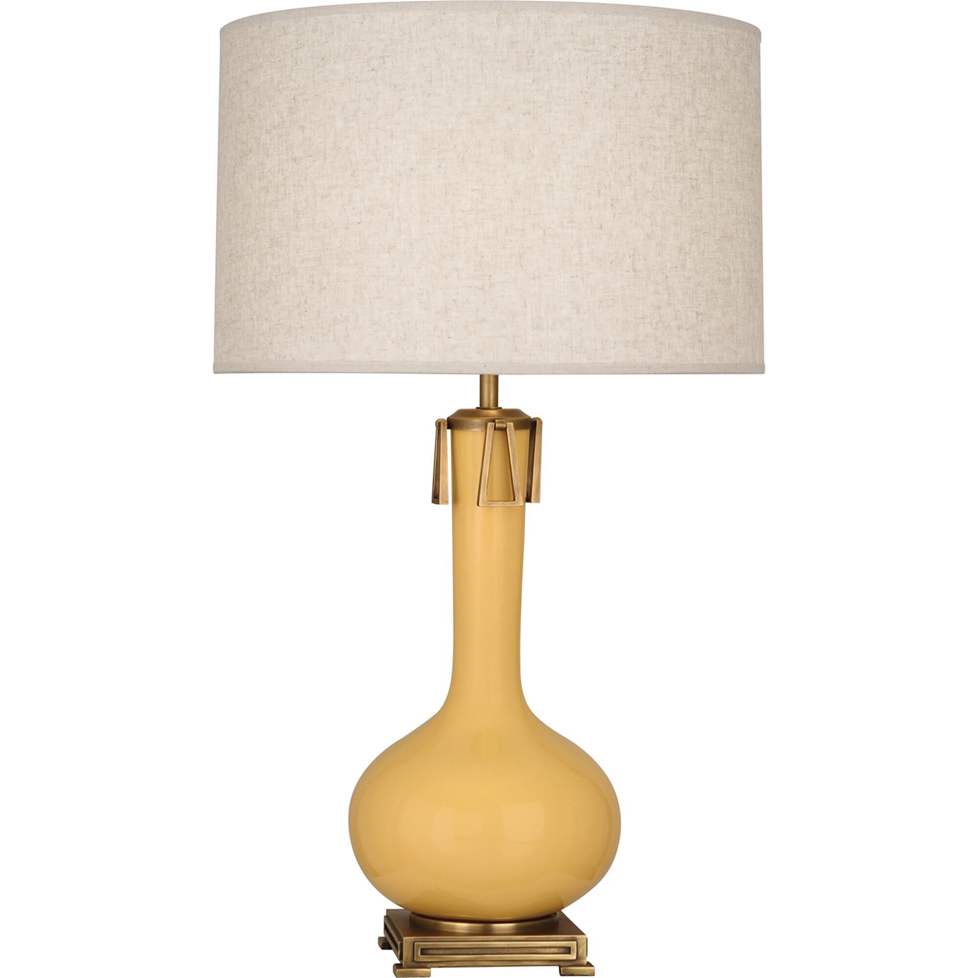 Shown in Sunset Yellow Glazed Ceramic With Aged Brass Accents finish and Open Weave Heather Linen shade