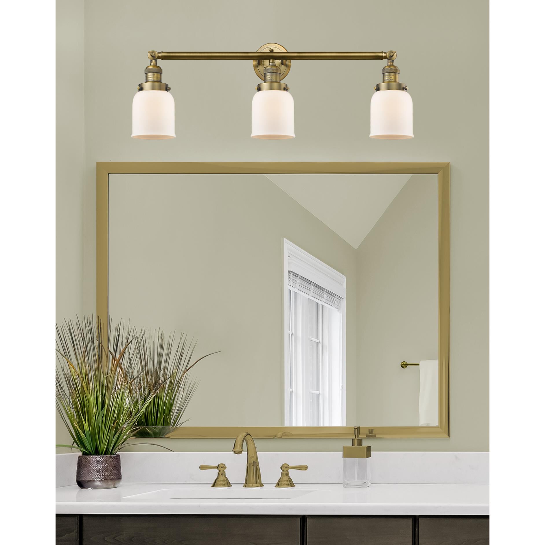 Shown in Brushed Brass finish and Matte White Cased glass