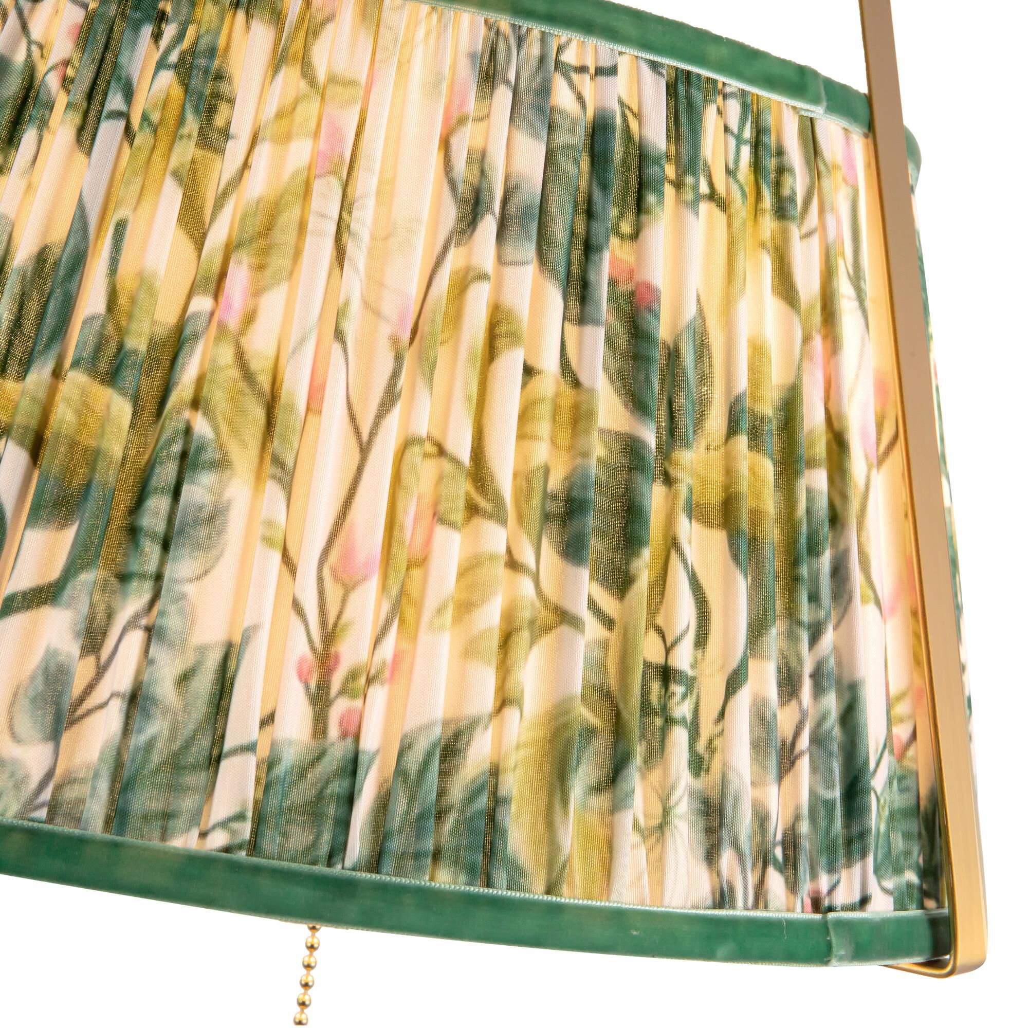 Shown in Brushed Gold finish and Green Linen shade