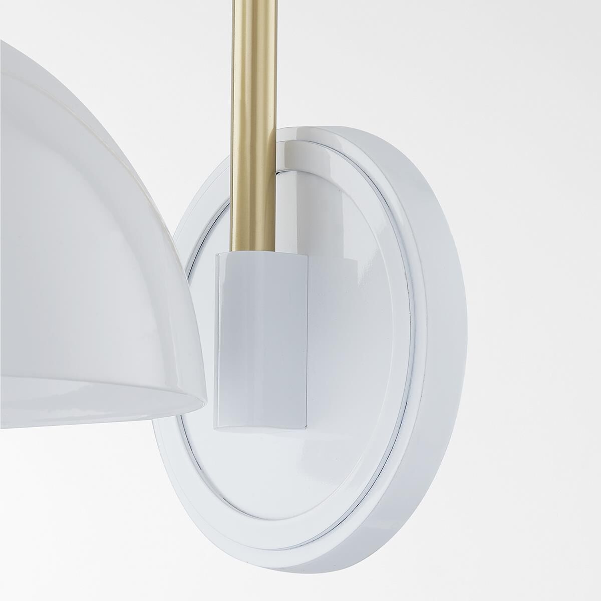 Shown in Aged Brass and Glossy White finish and Metal shade